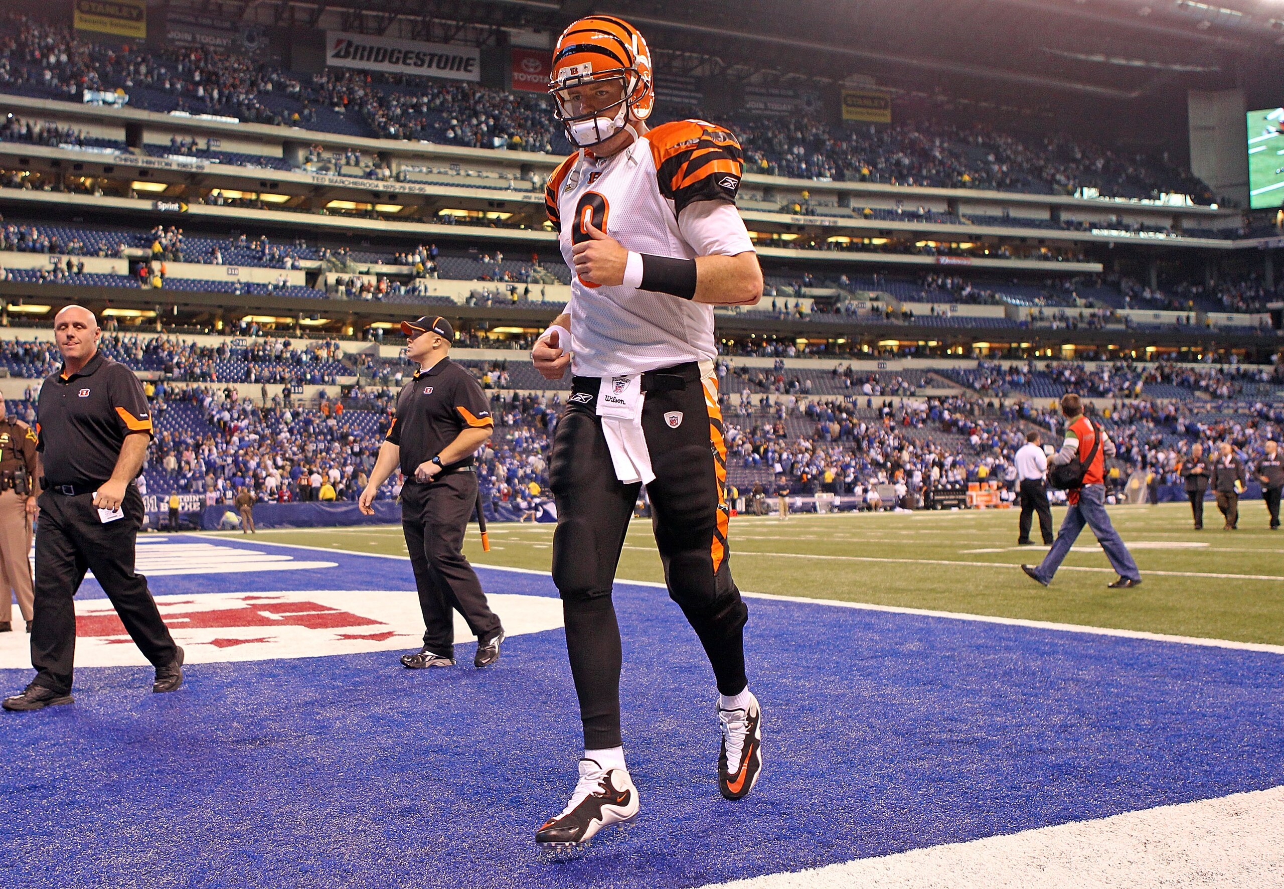 INDIANAPOLIS - NOVEMBER 14: Carson Palmer #9 of the Cincinnati Bengals runs off of the field following the Bengals 23-17 loss to the Indianapolis Colts in the NFL game at Lucas Oil Stadium on November 14, 2010 in Indianapolis, Indiana. The Colts won 23-17 INDIANAPOLIS - NOVEMBER 14: Carson Palmer #9 of the Cincinnati Bengals runs off of the field following the Bengals 23-17 loss to the Indianapolis Colts in the NFL game at Lucas Oil Stadium on November 14, 2010 in Indianapolis, Indiana. The Colts won 23-17