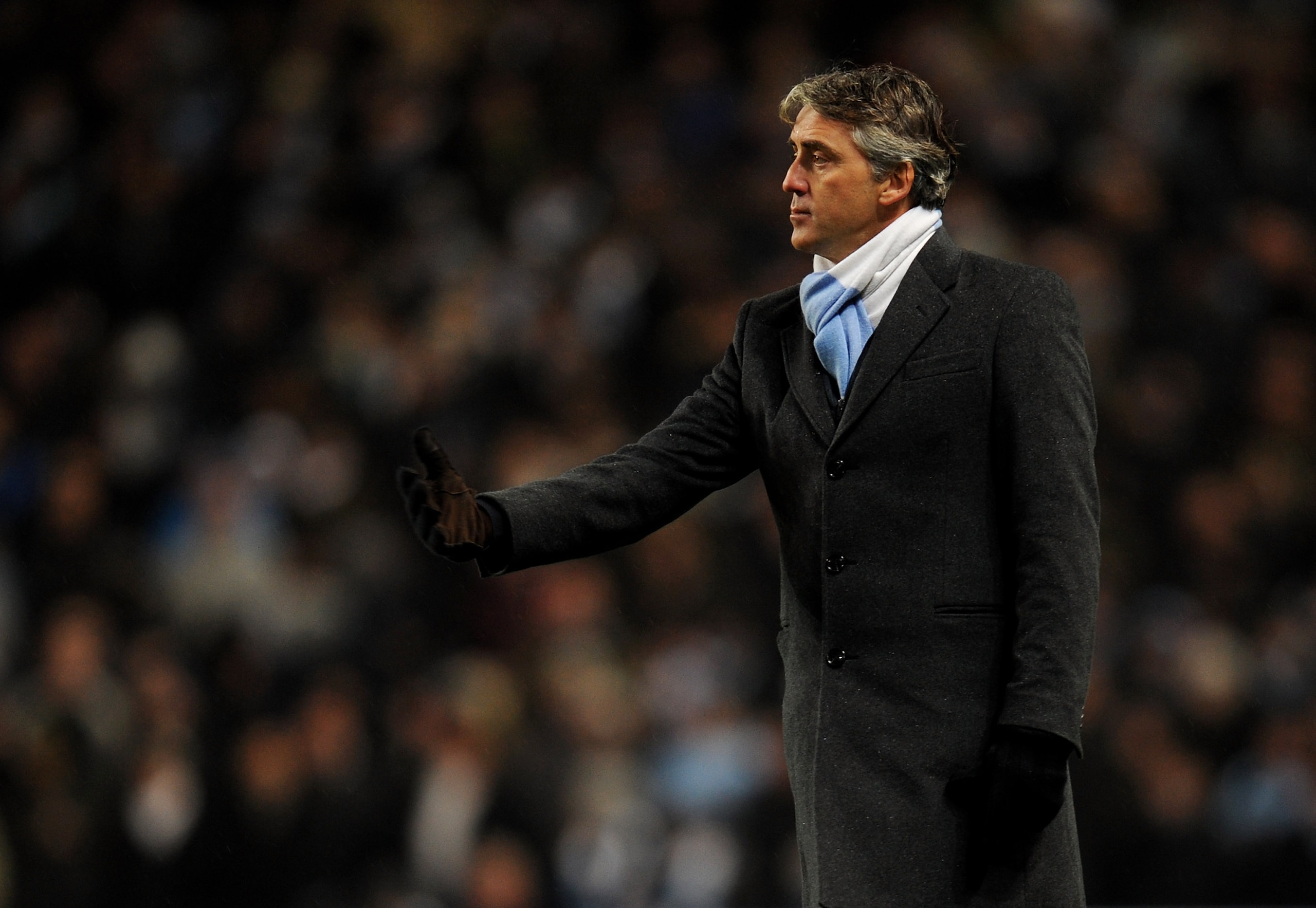 MANCHESTER, ENGLAND - DECEMBER 04:  Manchester City Manager Roberto Mancini gestures during the Barclays Premier League match between Manchester City and Bolton Wanderers at the City of Manchester Stadium on December 4, 2010 in Manchester, England.  (Phot