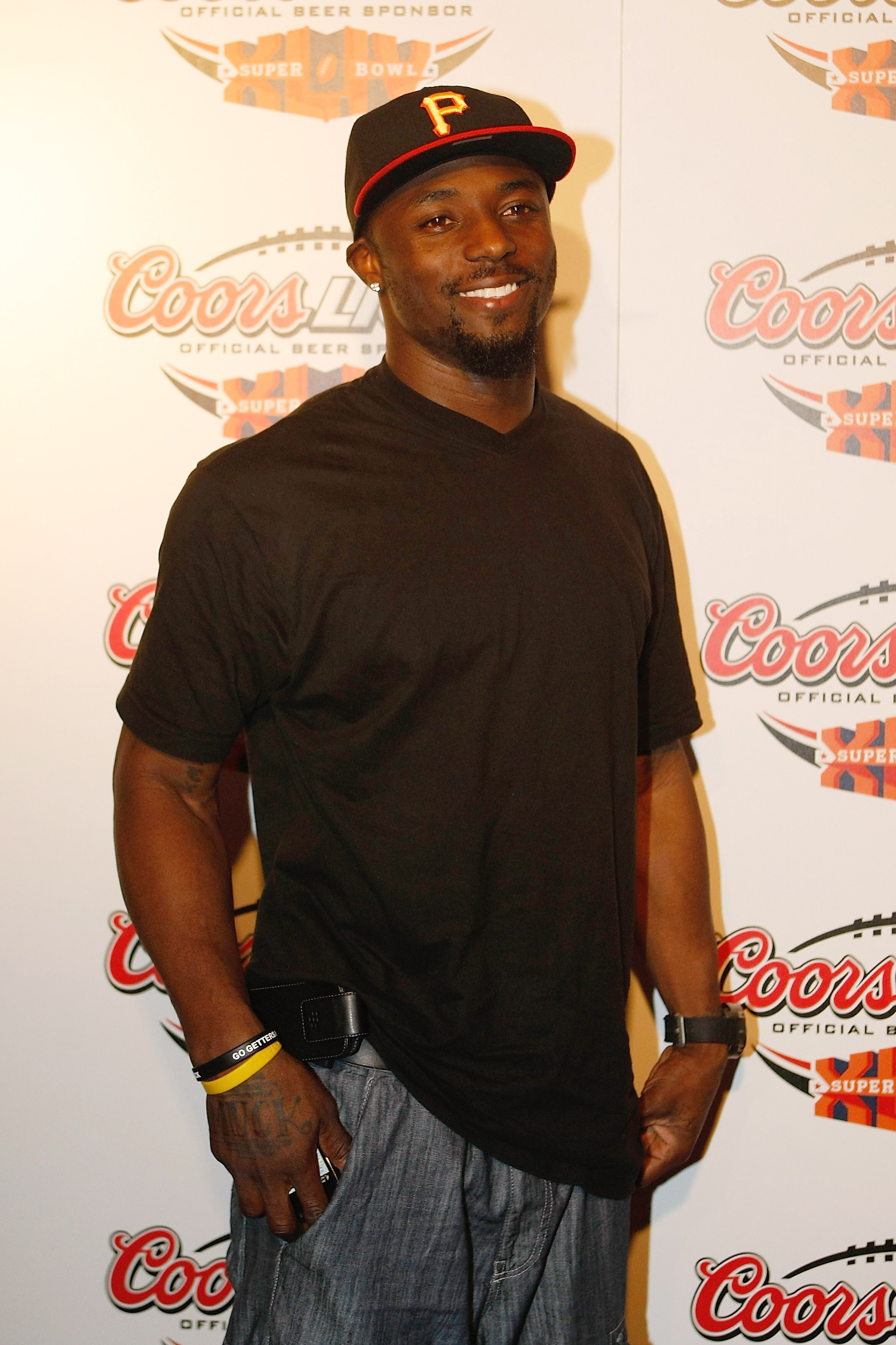 MIAMI - FEBRUARY 5: Wide receiver Santonio Holmes #10 of the Pittsburgh Steelers arrives at the Coors Light Super Bowl Bash at the Mansion on February 5, 2010 in Miami, Florida. (Photo by Scott Boehm/Getty Images)
