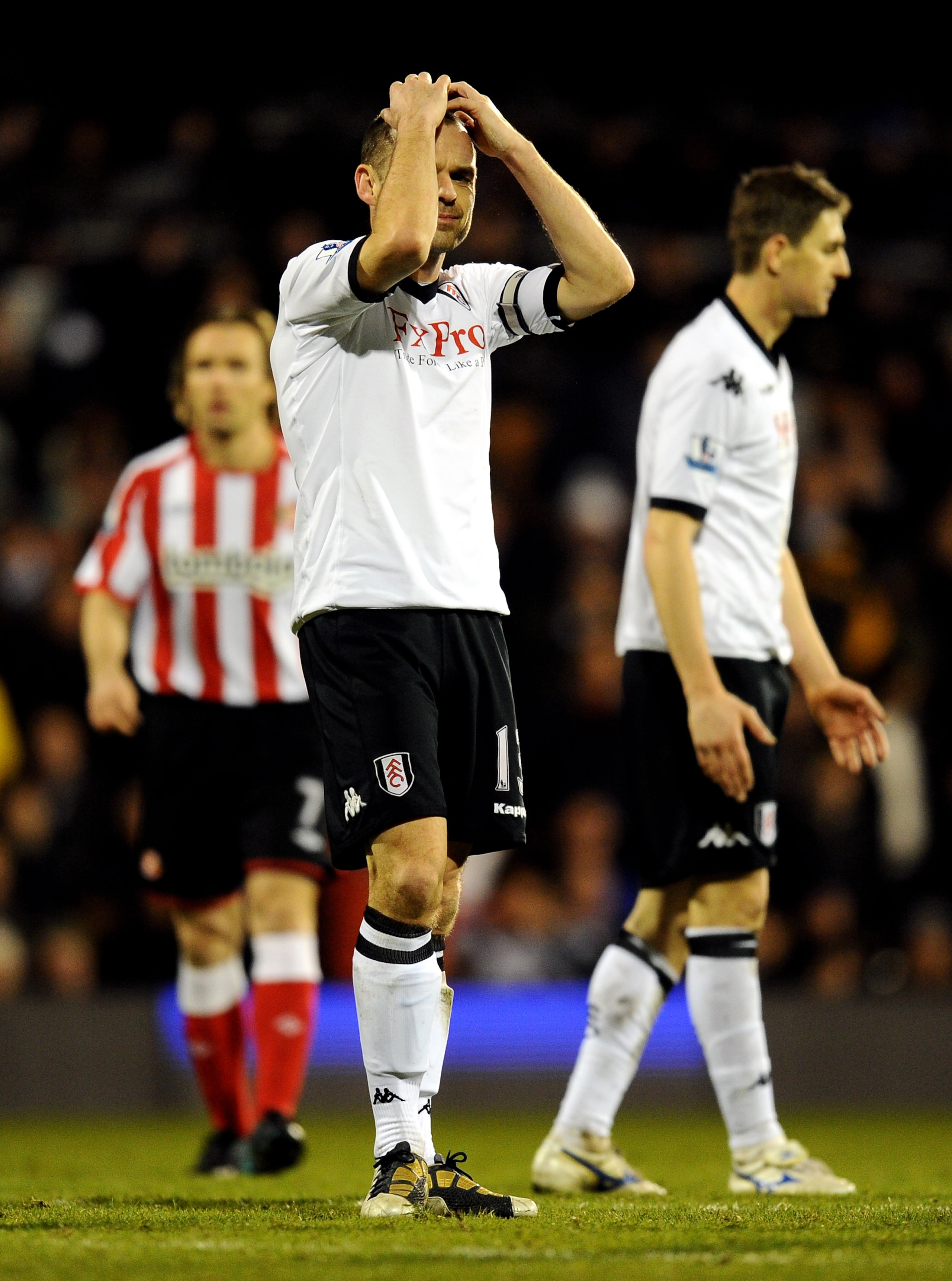 LONDON, ENGLAND - DECEMBER 11:  Danny Murphy of Fulham reacts during the Barclays Premier League match between Fulham and Sunderland at Craven Cottage on December 11, 2010 in London, England.  (Photo by Mike Hewitt/Getty Images)