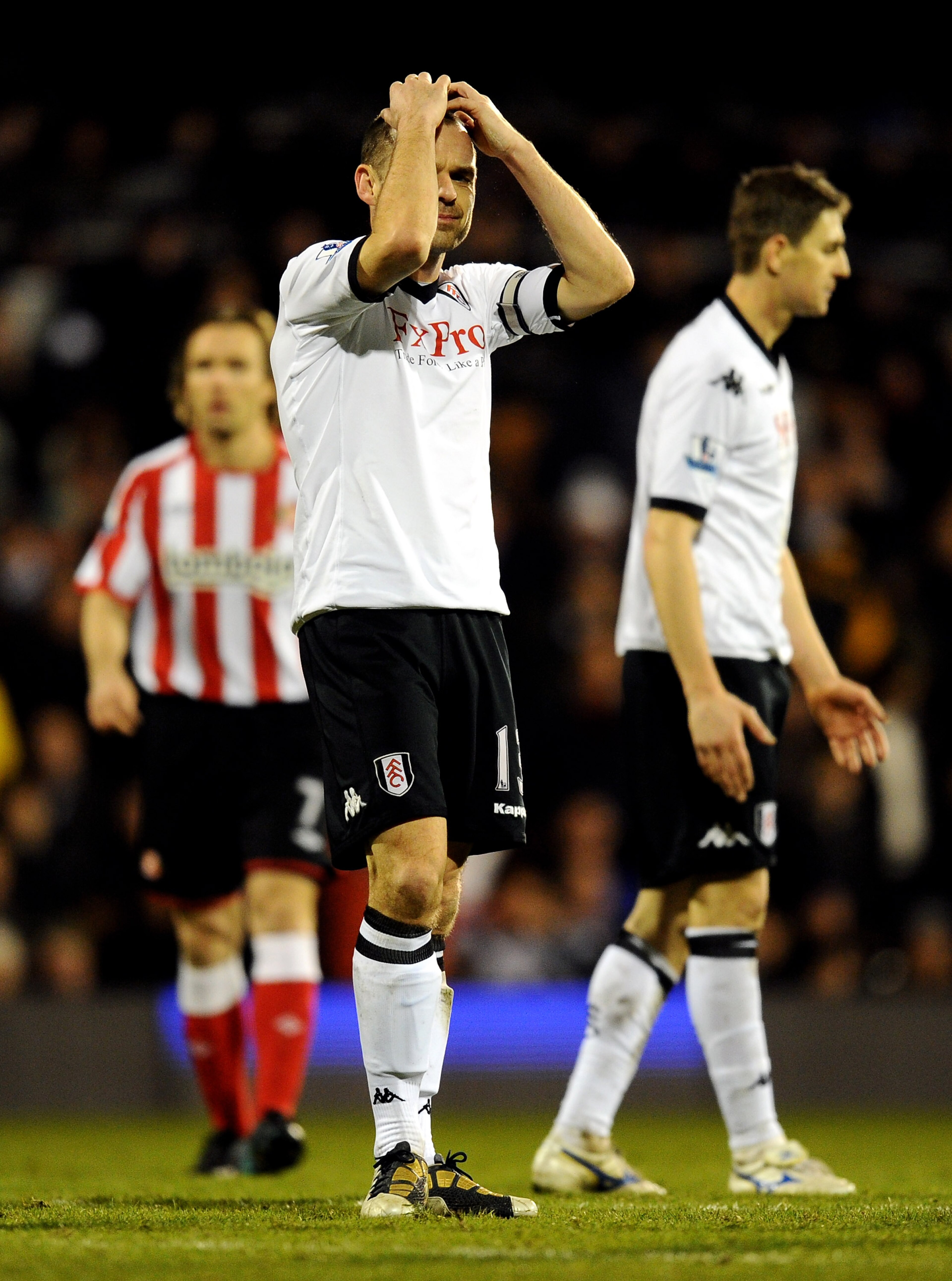 LONDON, ENGLAND - DECEMBER 11:  Danny Murphy of Fulham reacts during the Barclays Premier League match between Fulham and Sunderland at Craven Cottage on December 11, 2010 in London, England.  (Photo by Mike Hewitt/Getty Images)