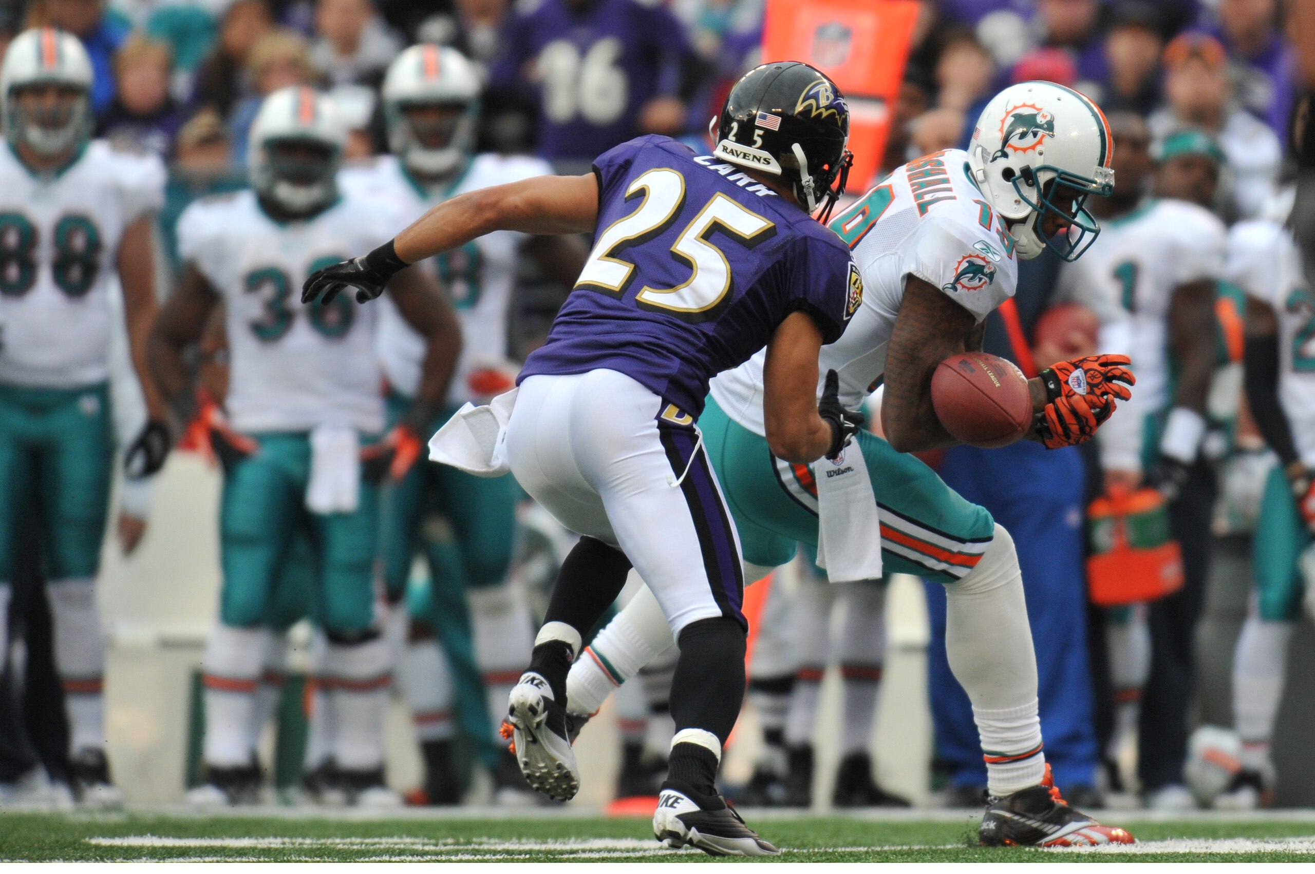 BALTIMORE, MD - NOVEMBER 7:  Brandon Marshall #19 of the Miami Dolphins can't make this catch against the Baltimore Ravens at M&T Bank Stadium on November 7, 2010 in Baltimore, Maryland. The Ravens defeated the Dolphins 26-10. (Photo by Larry French/Getty