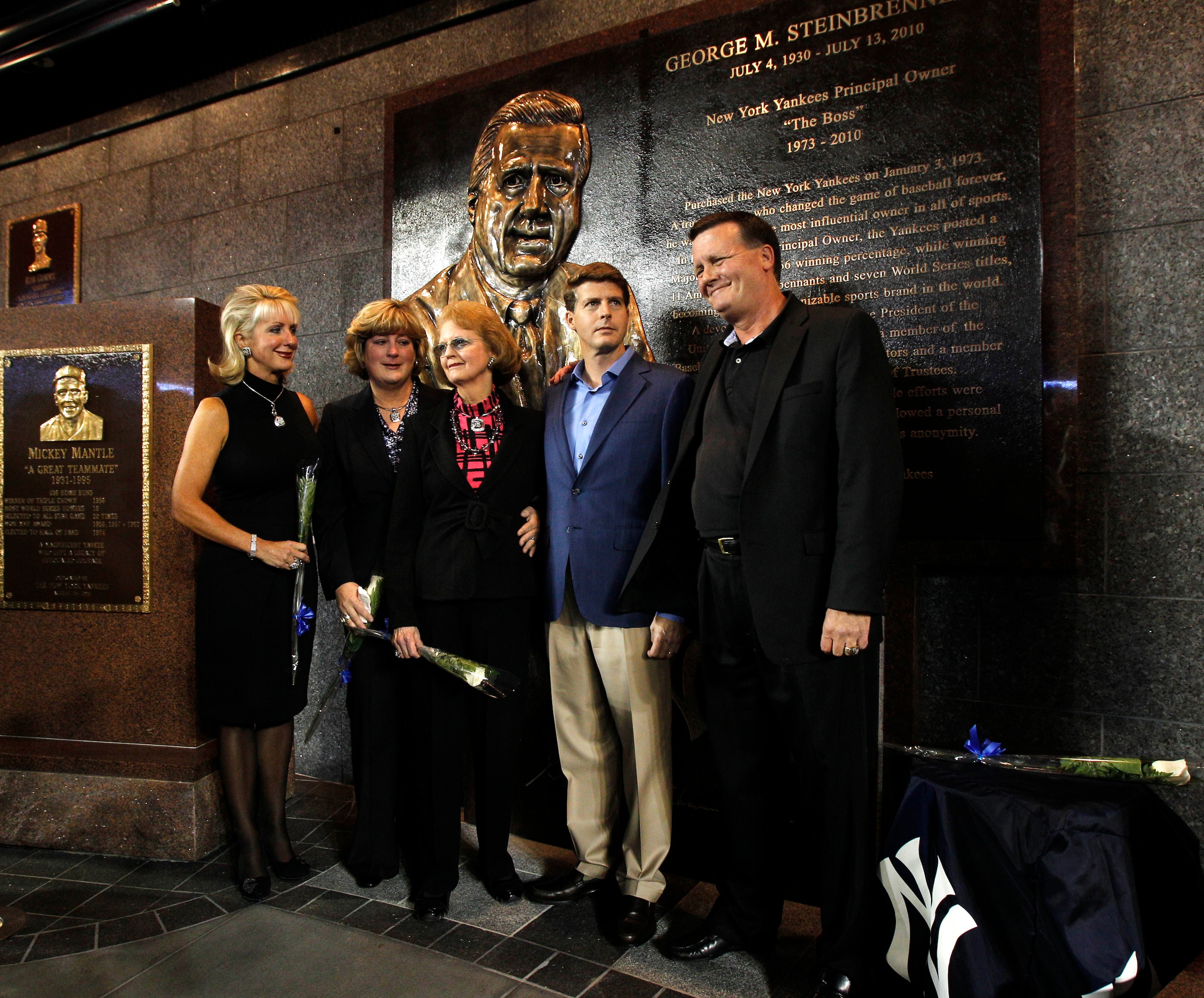 NEW YORK - SEPTEMBER 20:  Members of the Steinbrenner family pose for photographers following a ceremony dedicating a monument to the late Yankees principal owner George Steinbrenner before the Yankees baseball game against the Tampa Bay Rays on September