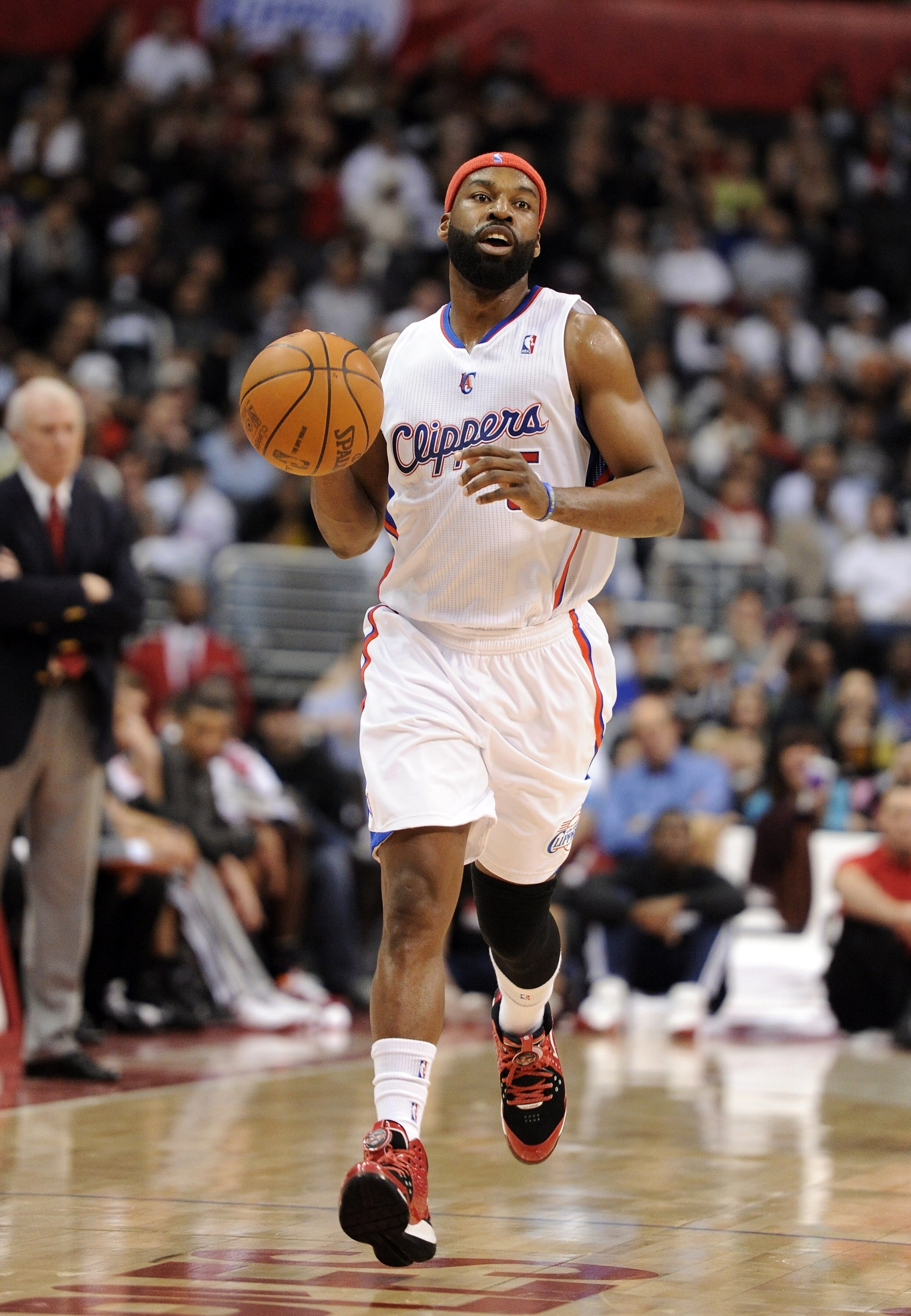 LOS ANGELES, CA - DECEMBER 01:  Baron Davis #5 of the Los Angeles Clippers dribbles up court  against the San Antonio Spurs at the Staples Center on December 1, 2010 in Los Angeles, California.  NOTE TO USER: User expressly acknowledges and agrees that, b