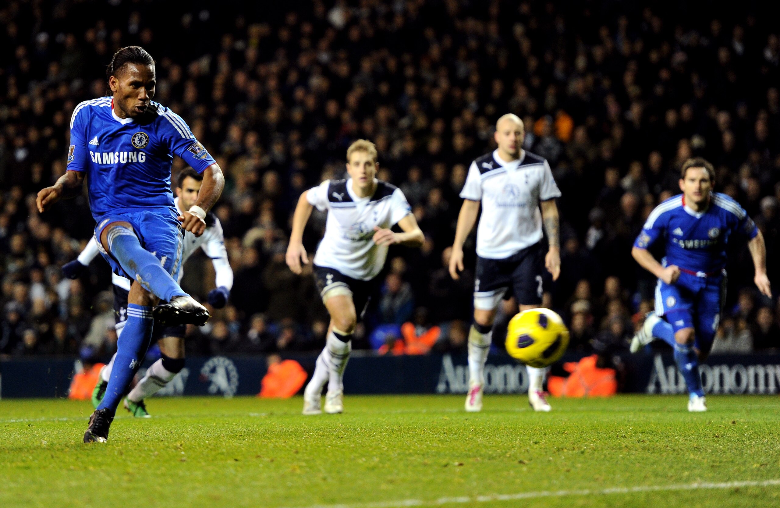 LONDON, ENGLAND - DECEMBER 12: Didier Drogba of Chelsea takes a penalty kick, which is saved by Spurs Goalkeeper Heurelho Gomes during the Barclays Premier League match between Tottenham Hotspur and Chelsea at White Hart Lane on December 12, 2010 in Londo
