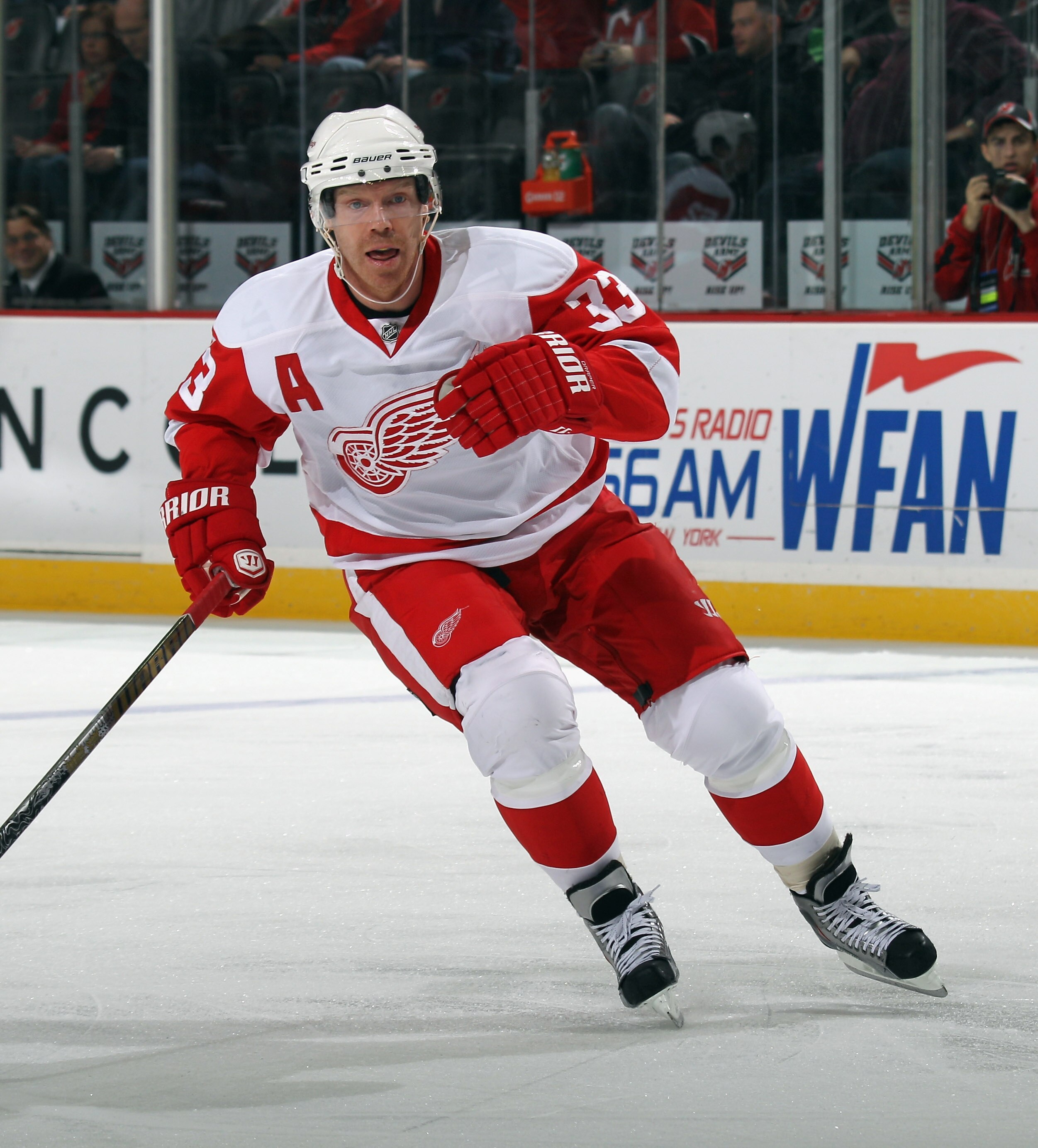 NEWARK, NJ - DECEMBER 11:  Kris Draper #33 of the Detroit Red Wings skates against the New Jersey Devils at the Prudential Center on December 11, 2010 in Newark, New Jersey. The Red Wings defeated the the Devils 4-1.  (Photo by Bruce Bennett/Getty Images)
