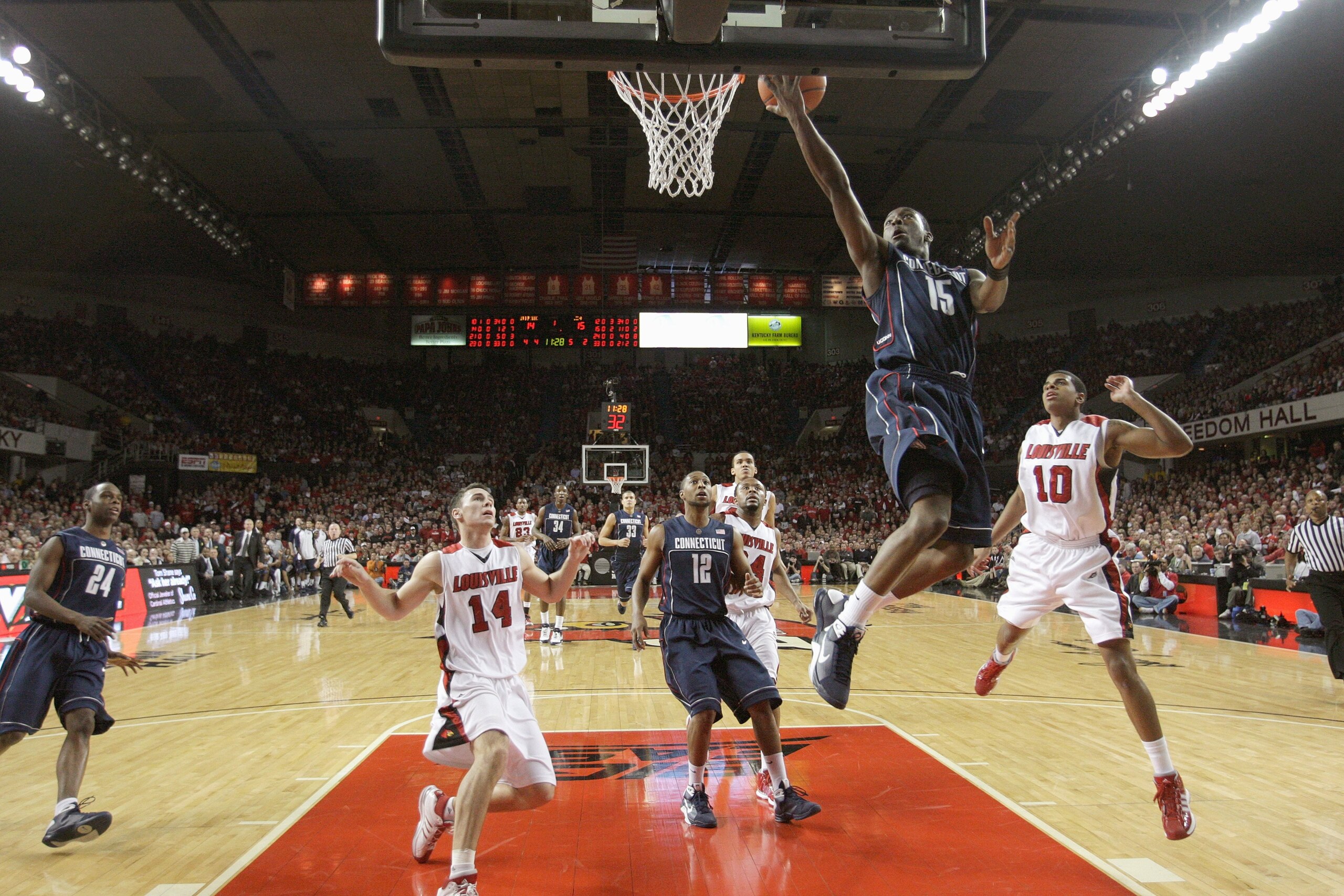 LOUISVILLE, KY - FEBRUARY 2:  Kemba Walker #15 of the Connecticut Huskies makes a layup during the Big East Conference game against the Louisville Cardinals on February 2, 2009 at Freedom Hall in Louisville, Kentucky.  (Photo by Andy Lyons/Getty Images)