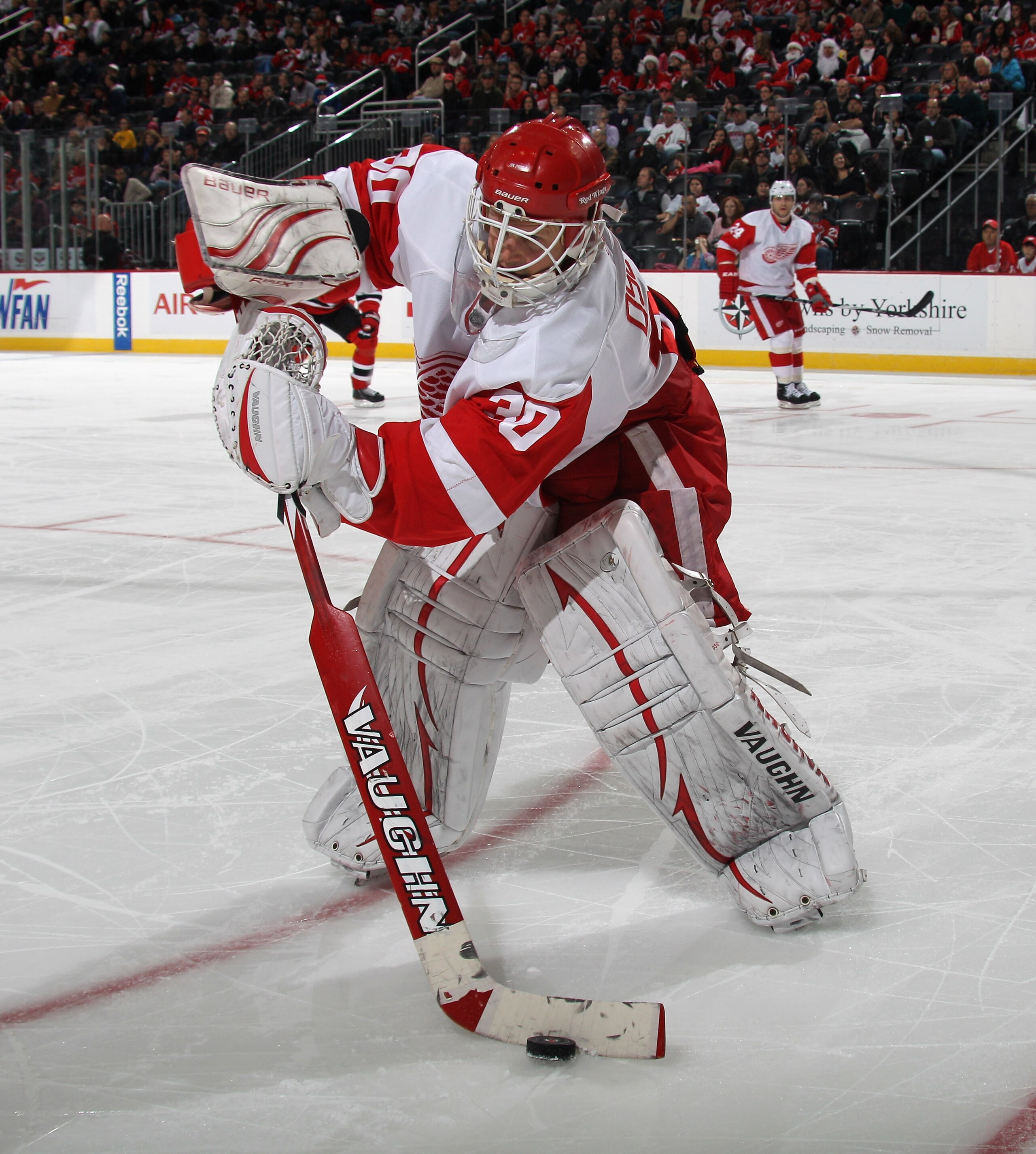 NEWARK, NJ - DECEMBER 11:  Chris Osgood #30 of the Detroit Red Wings tends net against the New Jersey Devils at the Prudential Center on December 11, 2010 in Newark, New Jersey. The Red Wings defeated the the Devils 4-1.  (Photo by Bruce Bennett/Getty Ima