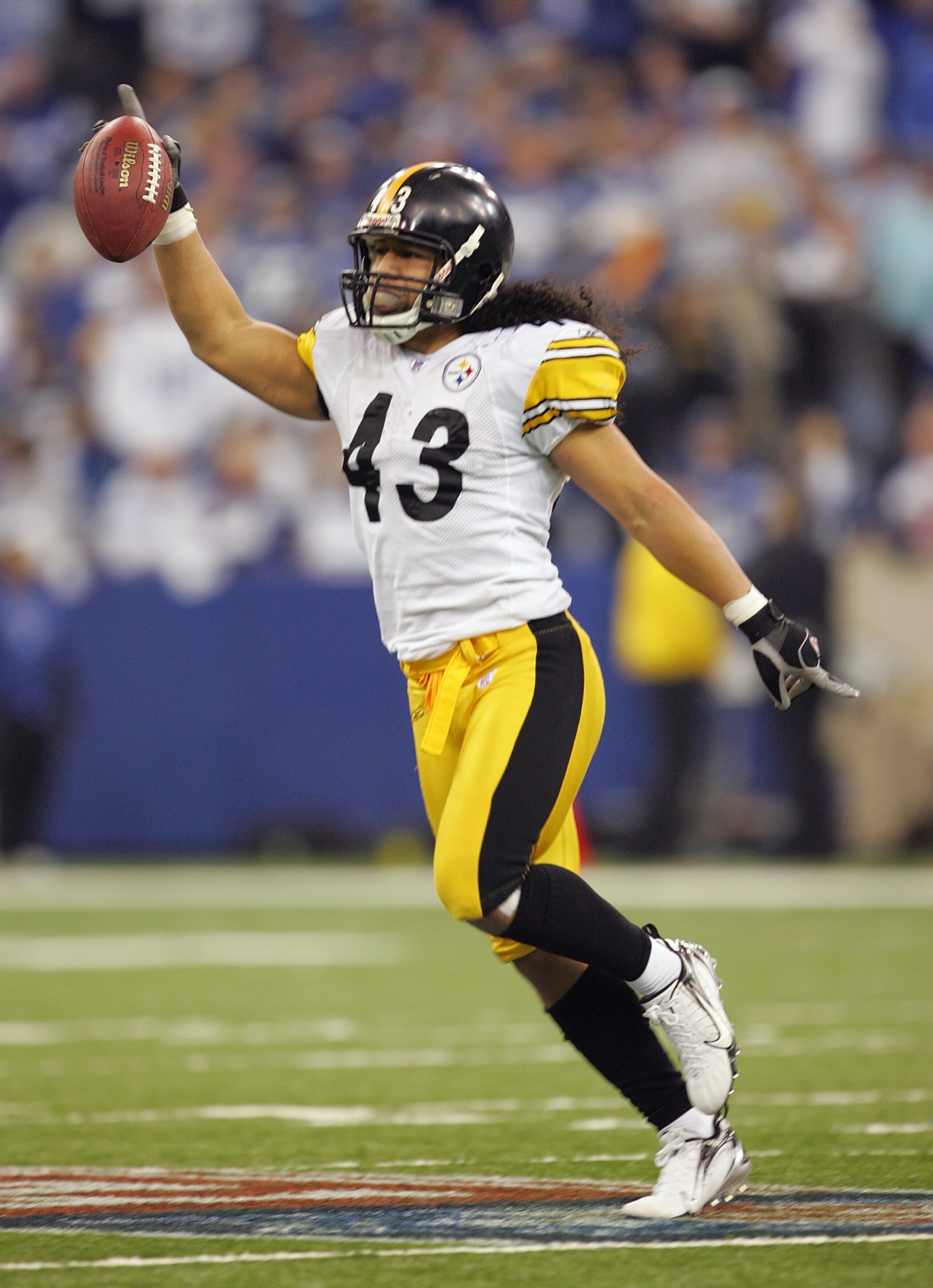 INDIANAPOLIS - JANUARY 15: Troy Polamalu #43 of the Pittsburgh Steelers runs off the field as he celebrates an interception, the interception was overturned when the ball was ruled incomplete after a replay challenge against the Indianapolis Colts during