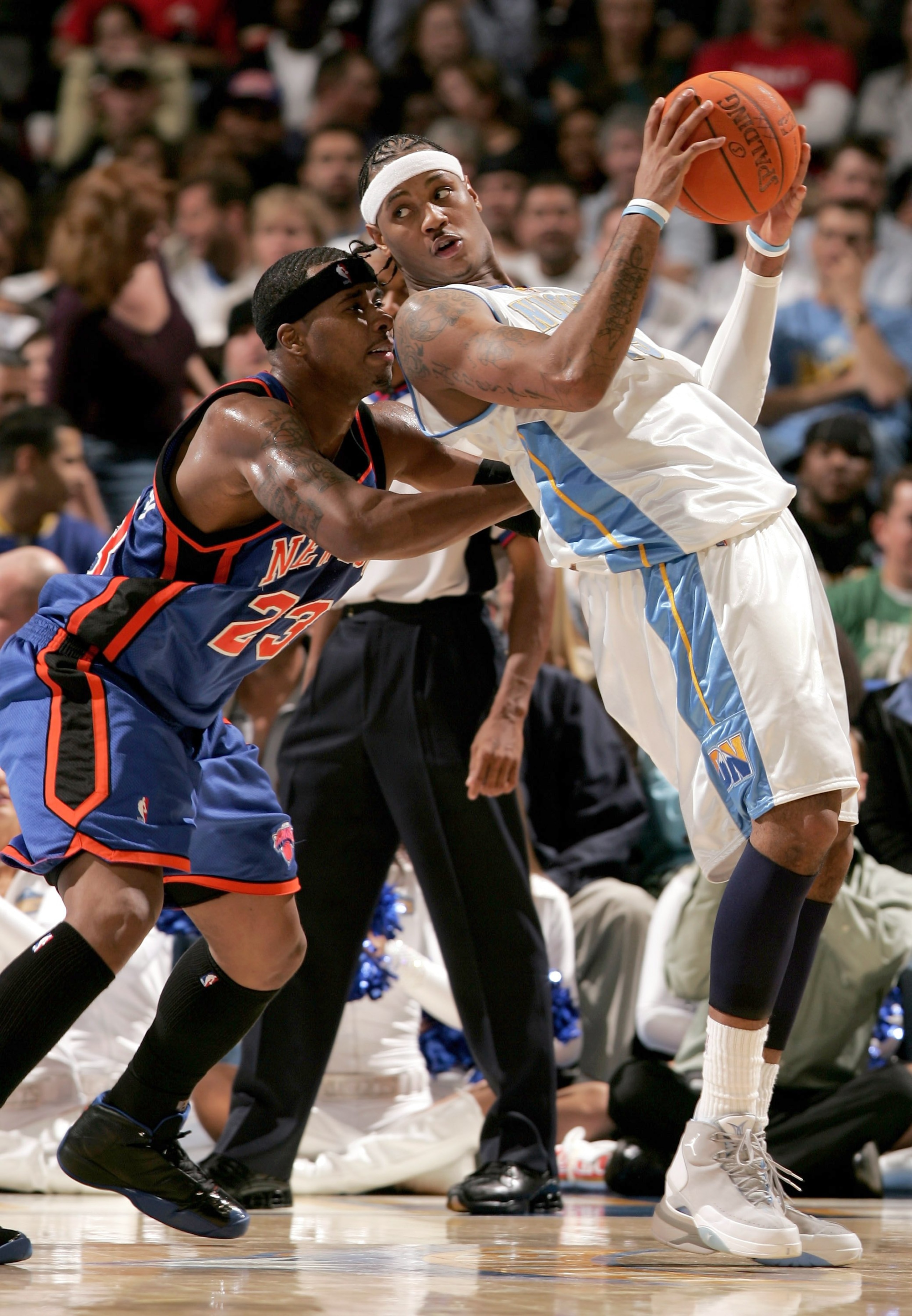 DENVER - NOVEMBER 08:  Carmelo Anthony #15 of the Denver Nuggets pressures Quentin Richardson #23 of the New York Knicks as the Knicks defeated the Nuggets 109-107 on November 8, 2006 at the Pepsi Center in Denver, Colorado.  NOTE TO USER: User expressly