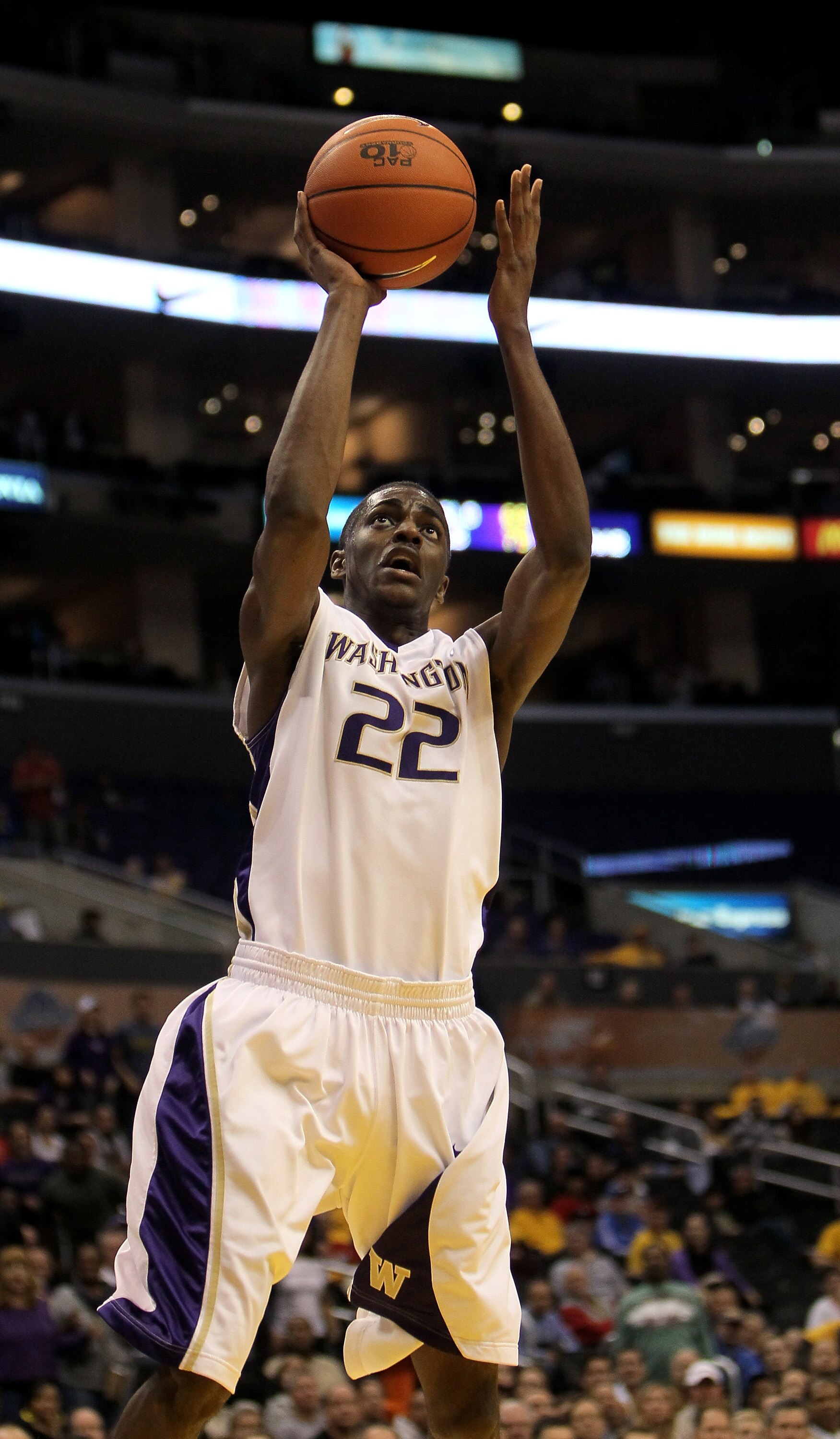 LOS ANGELES - MARCH 11: Justin Holiday #22 of the Washington Huskies shoots against the Oregon State Beavers during the quarterfinals of the Pac-10 Basketball Tournament at Staples Center on March 11, 2010 in Los Angeles, California.  Washington won 59-52