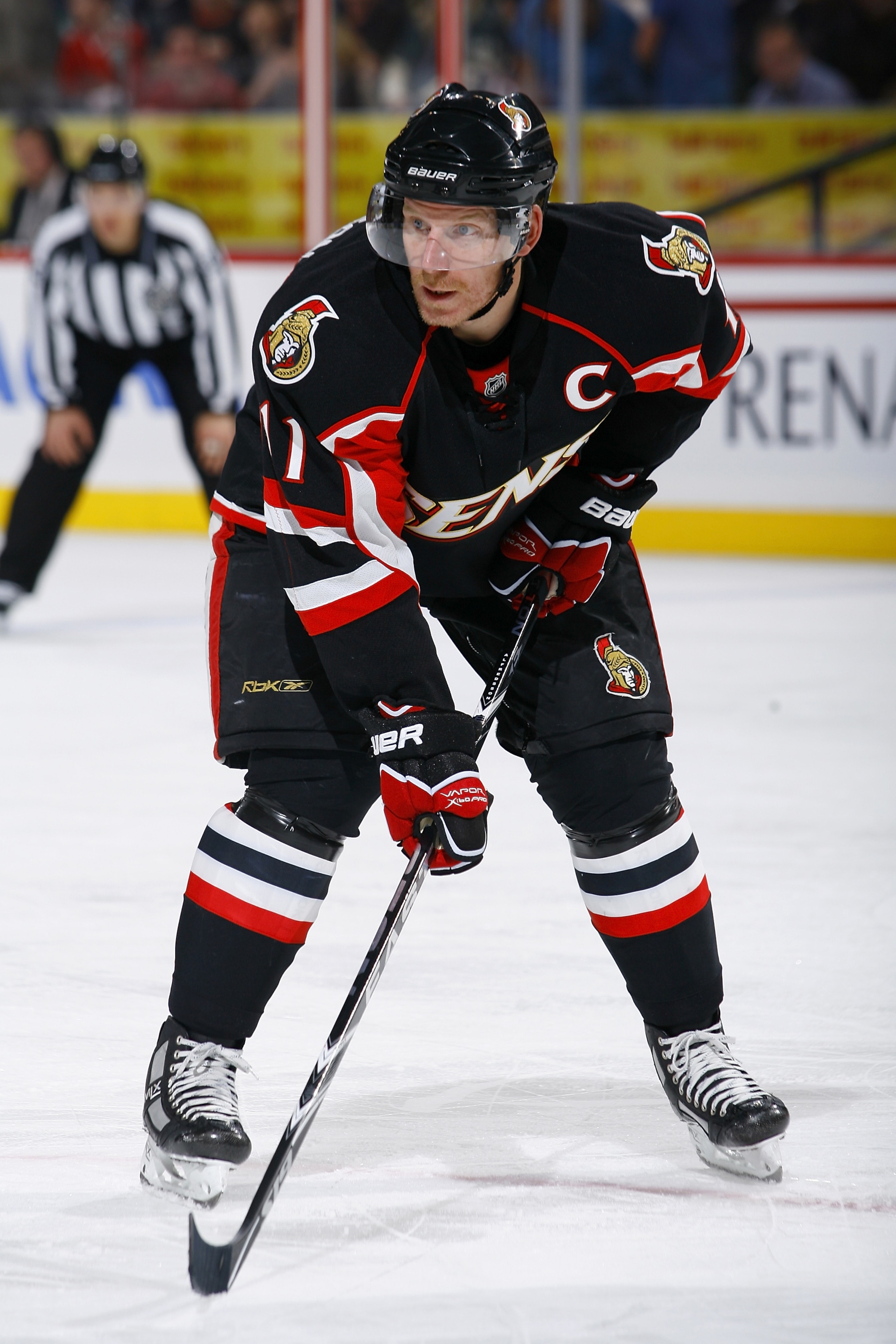 OTTAWA, ON - NOVEMBER 24: Daniel Alfredsson #11 of the Ottawa Senators waits for a faceoff in a game against the Dallas Stars at Scotiabank Place on November 24, 2010 in Ottawa, Ontario, Canada. (Photo by Phillip MacCallum/Getty Images)