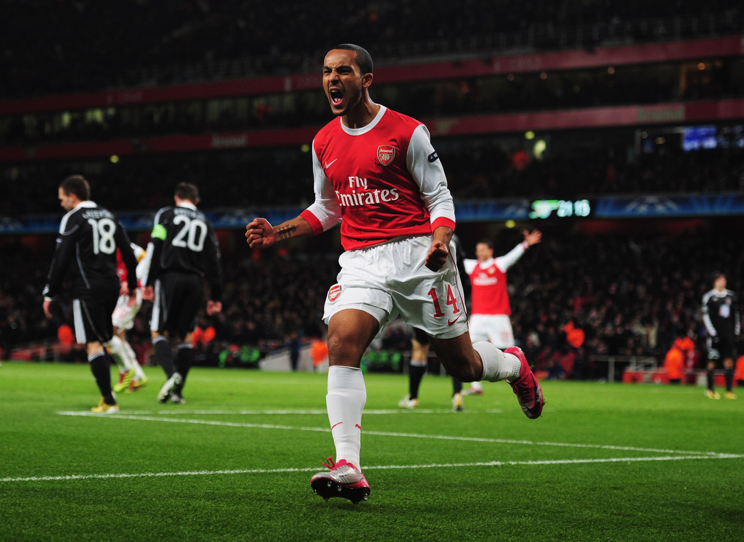 LONDON, ENGLAND - DECEMBER 08:  Theo Walcott of Arsenal celebrates as he scores their second goal during the UEFA Champions League Group H match between Arsenal and FK Partizan Belgrade at the Emirates Stadium on December 8, 2010 in London, England.  (Pho
