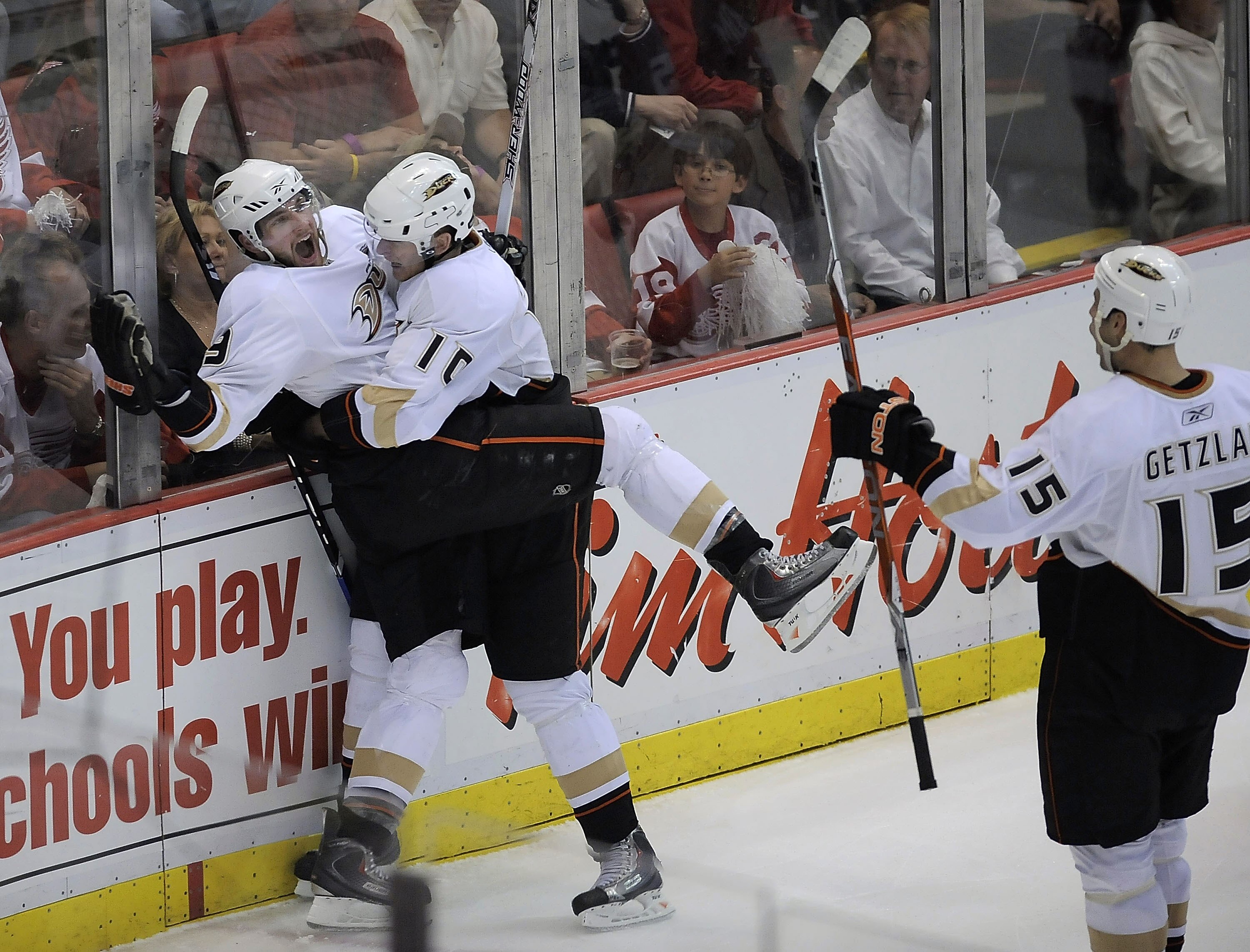 DETROIT - MAY 14: Bobby Ryan #9 of the Anaheim Ducks celebrates his third period goal with Corey Perry #10 and Ryan Getzlaf #15 while playing the Detroit Red Wings in Game Seven of the Western Conference Semifinals of the 2009 NHL Stanley Cup Playoffs on