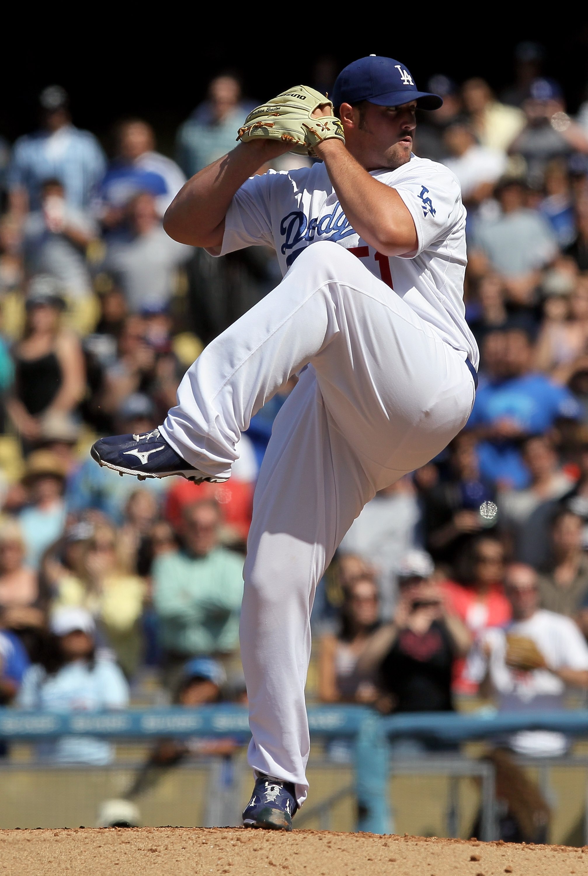 LOS ANGELES, CA - MAY 09:  Jonathan Broxton #51 of the Los Angeles Dodgers pitches against the Colorado Rockies at Dodger Stadium on May 9, 2010 in Los Angeles, California.  (Photo by Jeff Gross/Getty Images)