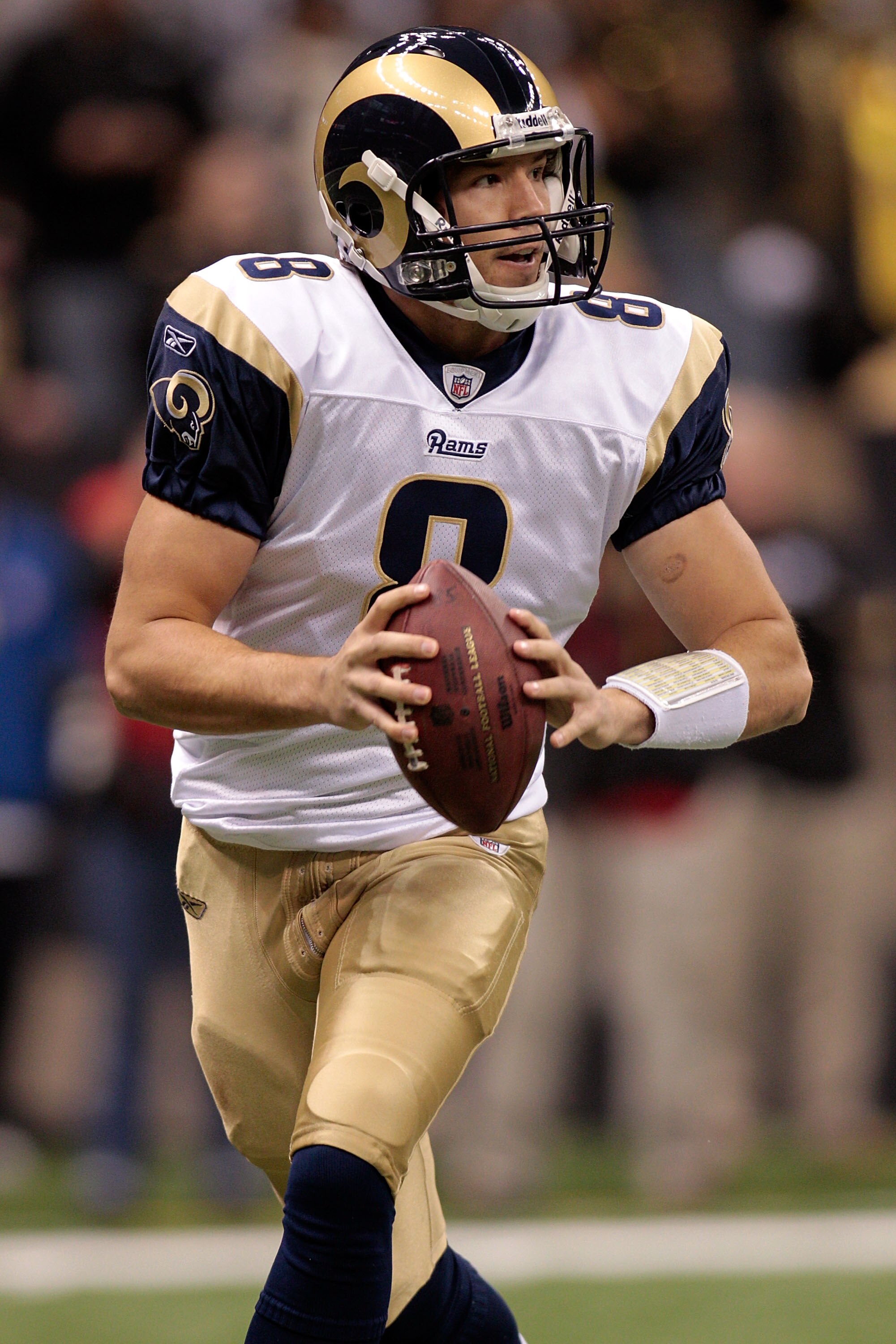 NEW ORLEANS, LA - DECEMBER 12:  Quarterback Sam Bradford #8 of the St. Louis Rams looks to throw a pass during the game against the New Orleans Saints at the Louisiana Superdome on December 12, 2010 in New Orleans, Louisiana.  (Photo by Chris Graythen/Get