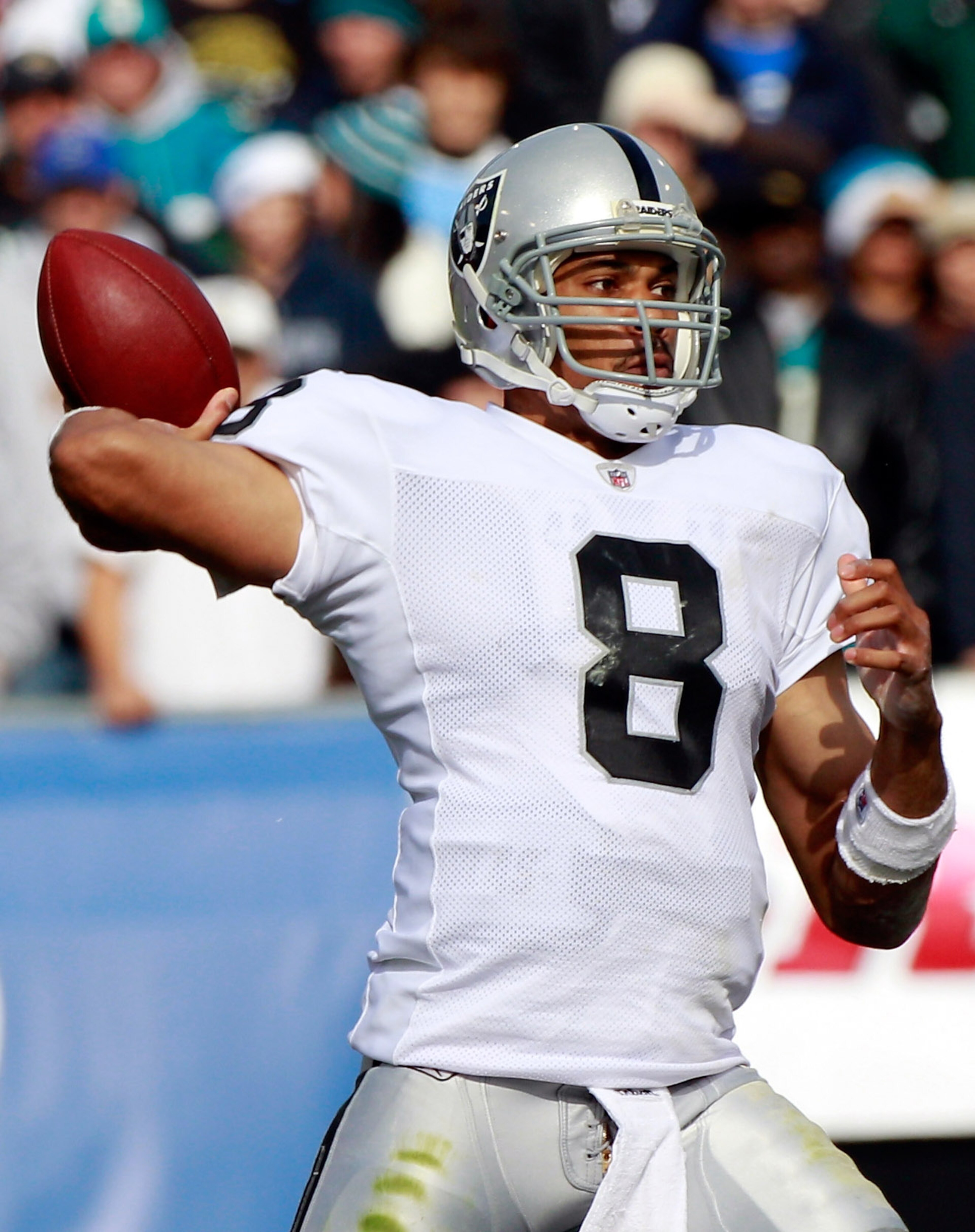 JACKSONVILLE, FL - DECEMBER 12:  Jason Campbell #8 of the Oakland Raiders attempts a pass during the game against the Jacksonville Jaguars at EverBank Field on December 12, 2010 in Jacksonville, Florida.  (Photo by Sam Greenwood/Getty Images)