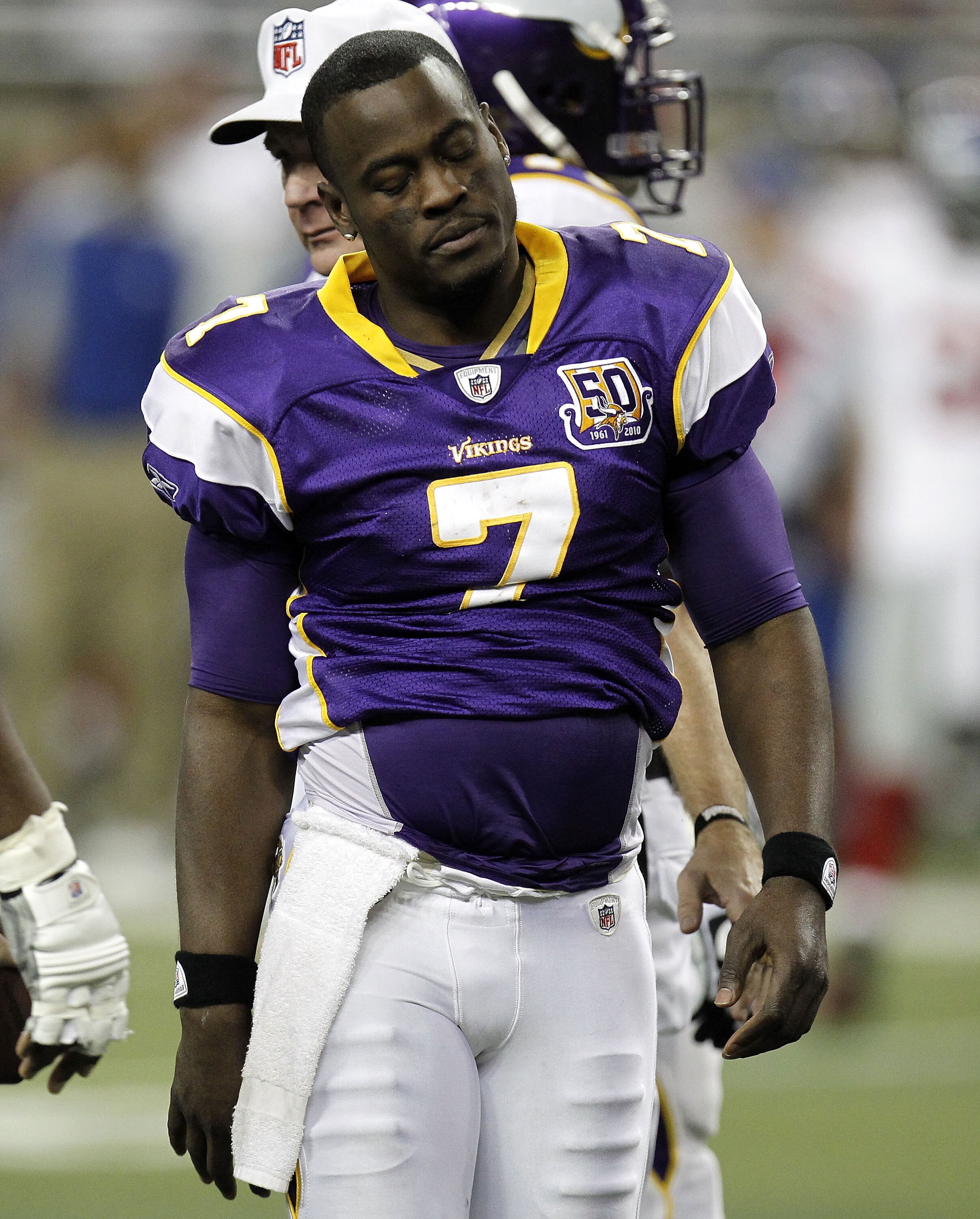 DETROIT, MI - DECEMBER 13:  Tavaris Jackson #7 of the Minnesota Vikings walks to get his helmet after a play while playing the New York Giants at Ford Field on December 13, 2010 in Detroit, Michigan. New York won the game 21-3.  (Photo by Gregory Shamus/G