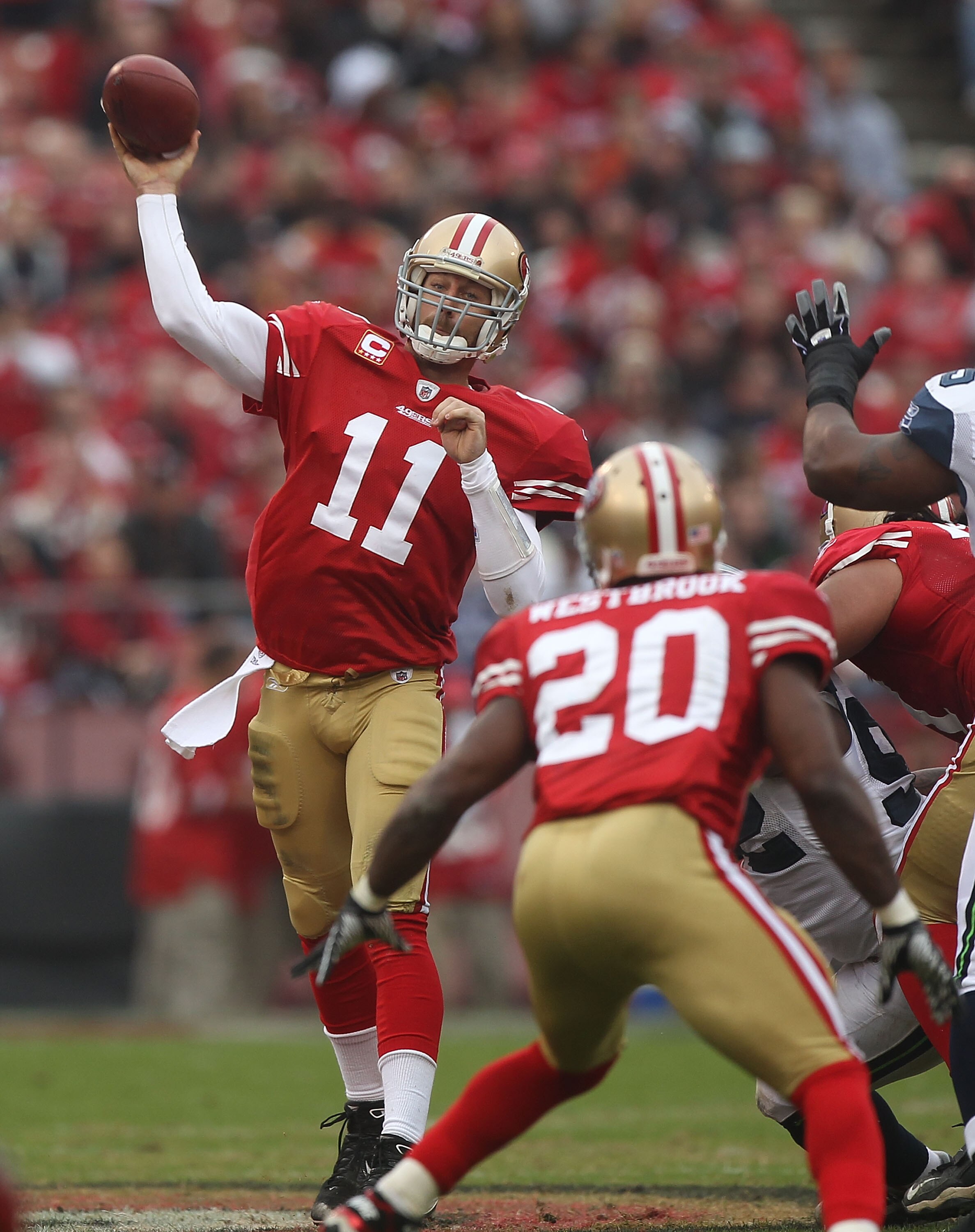 SAN FRANCISCO - DECEMBER 12:    Alex Smith #11 of the San Francisco 49ers passes against the Seattle Seahawks during an NFL game at Candlestick Park on December 12, 2010 in San Francisco, California.  (Photo by Jed Jacobsohn/Getty Images)