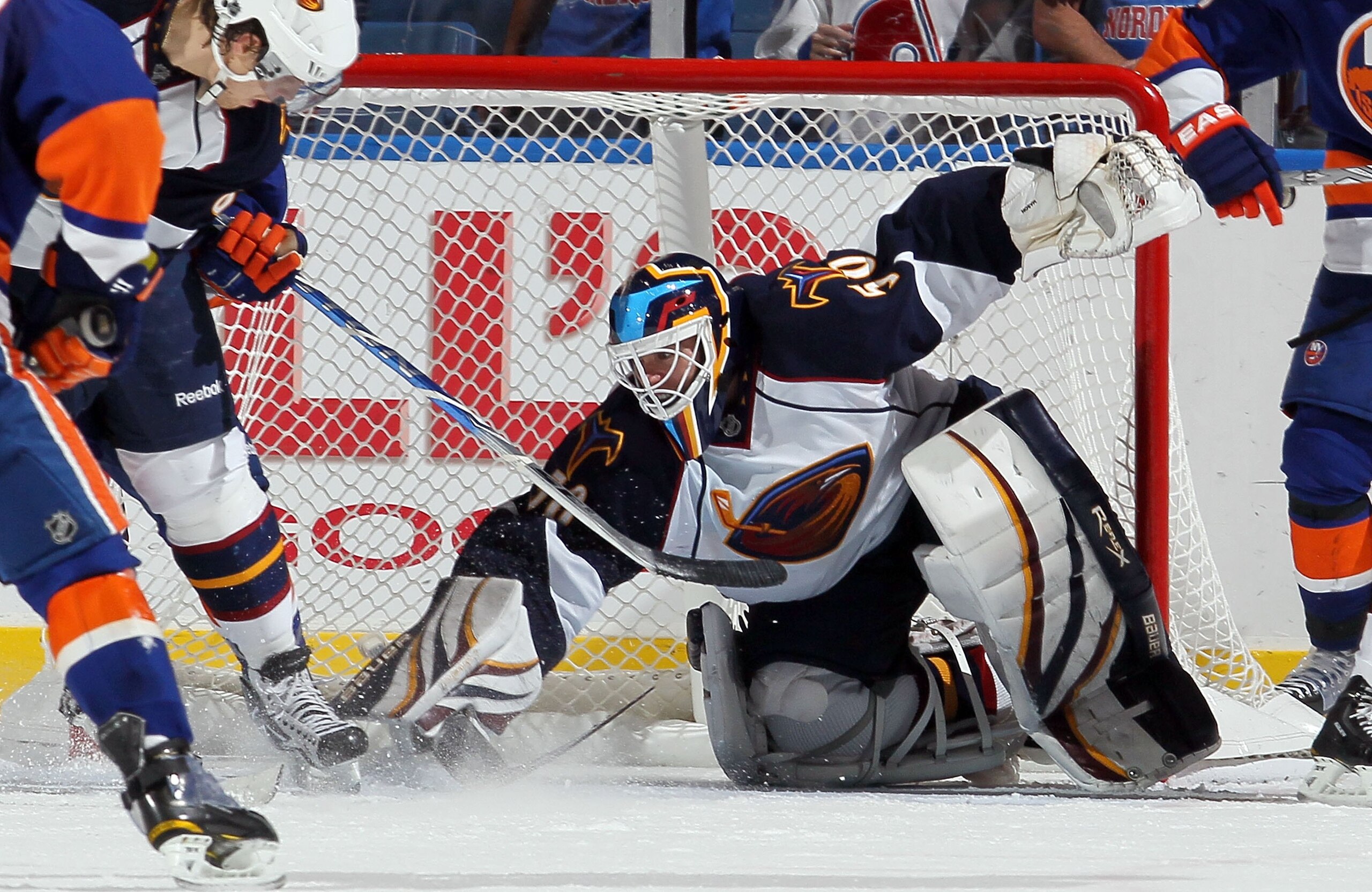 UNIONDALE, NY - DECEMBER 11: Chris Mason #50 of the Atlanta Thrashers in against the New York Islanders on December 11, 2010 at Nassau Coliseum in Uniondale, New York. The Thrashers defeated the Isles 5-4. (Photo by Jim McIsaac/Getty Images) UNIONDALE, NY - DECEMBER 11: Chris Mason #50 of the Atlanta Thrashers in against the New York Islanders on December 11, 2010 at Nassau Coliseum in Uniondale, New York. The Thrashers defeated the Isles 5-4. (Photo by Jim McIsaac/Getty Images)