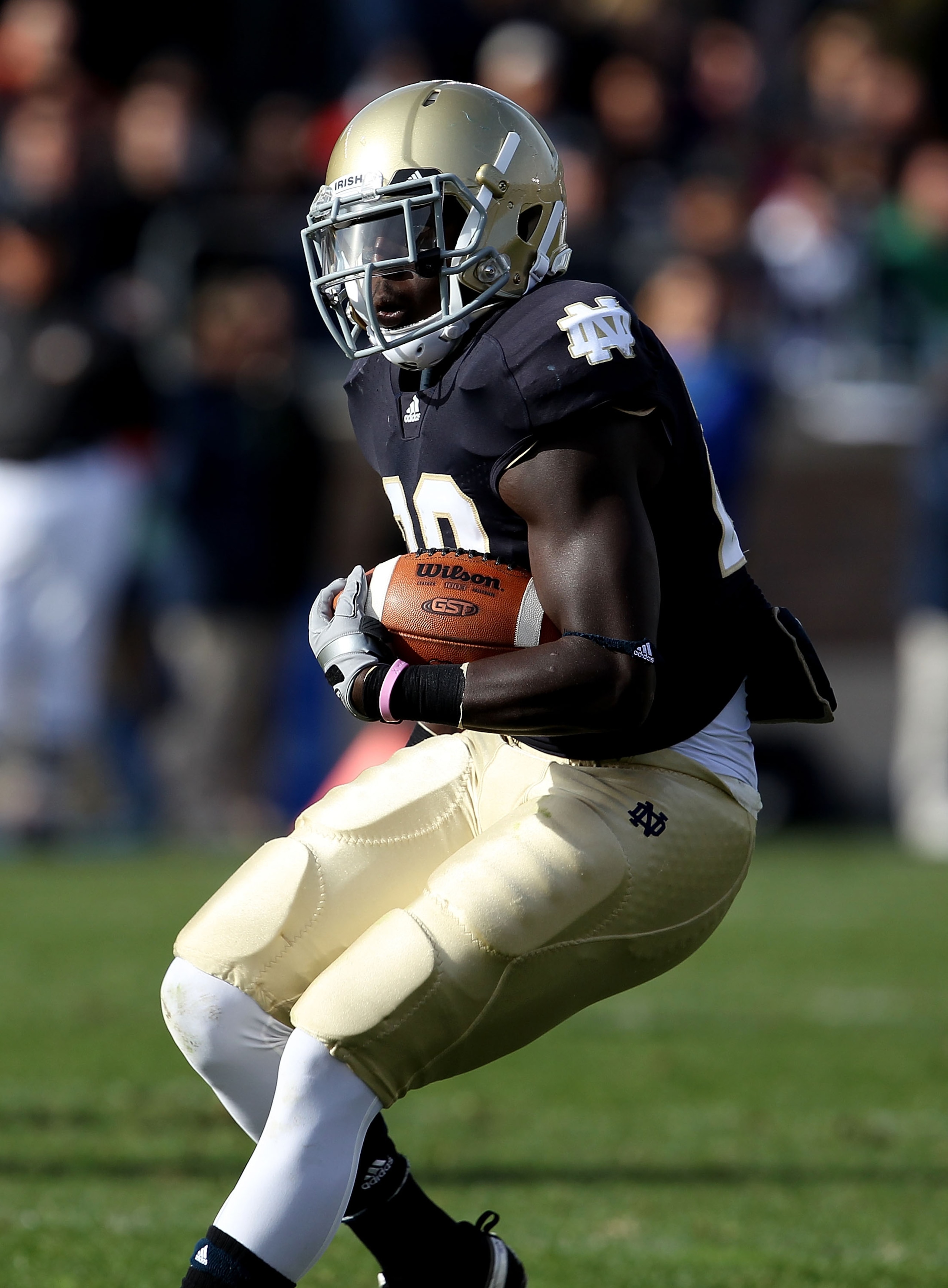 SOUTH BEND, IN - OCTOBER 30: Cierre Wood #20 of the Notre Dame Fighting Irish runs against the Tulsa Golden Hurricane at Notre Dame Stadium on October 30, 2010 in South Bend, Indiana. Tulsa defeated Notre Dame 28-27. (Photo by Jonathan Daniel/Getty Images