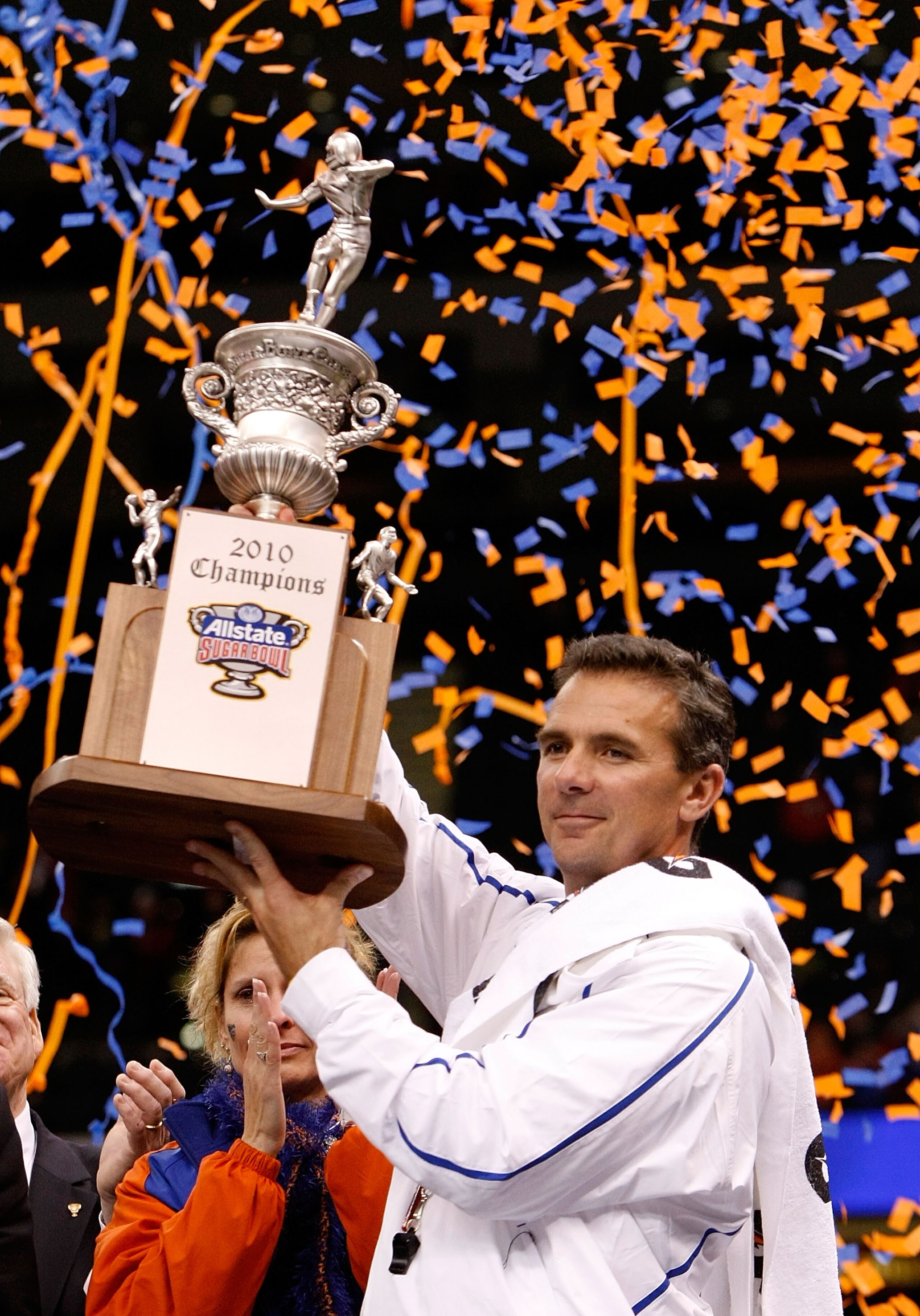 NEW ORLEANS - JANUARY 01:  Head coach Urban Meyer of the Florida Gators hoist the trophy after the Gators defeated the Cincinnati Bearcats 24-51 in the Allstate Sugar Bowl at the Louisana Superdome on January 1, 2010 in New Orleans, Louisiana.  (Photo by