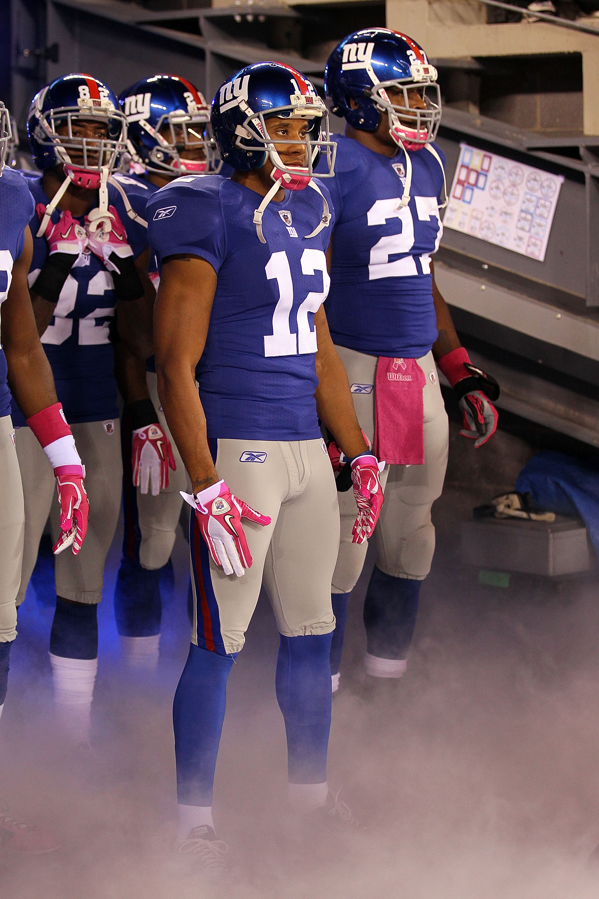 EAST RUTHERFORD, NJ - OCTOBER 03:  Mario Manningham #82, Steve Smith #12 and Brandon Jacobs #27 of the New York Giants are introduced before playing against the Chicago Bears at New Meadowlands Stadium on October 3, 2010 in East Rutherford, New Jersey.  (