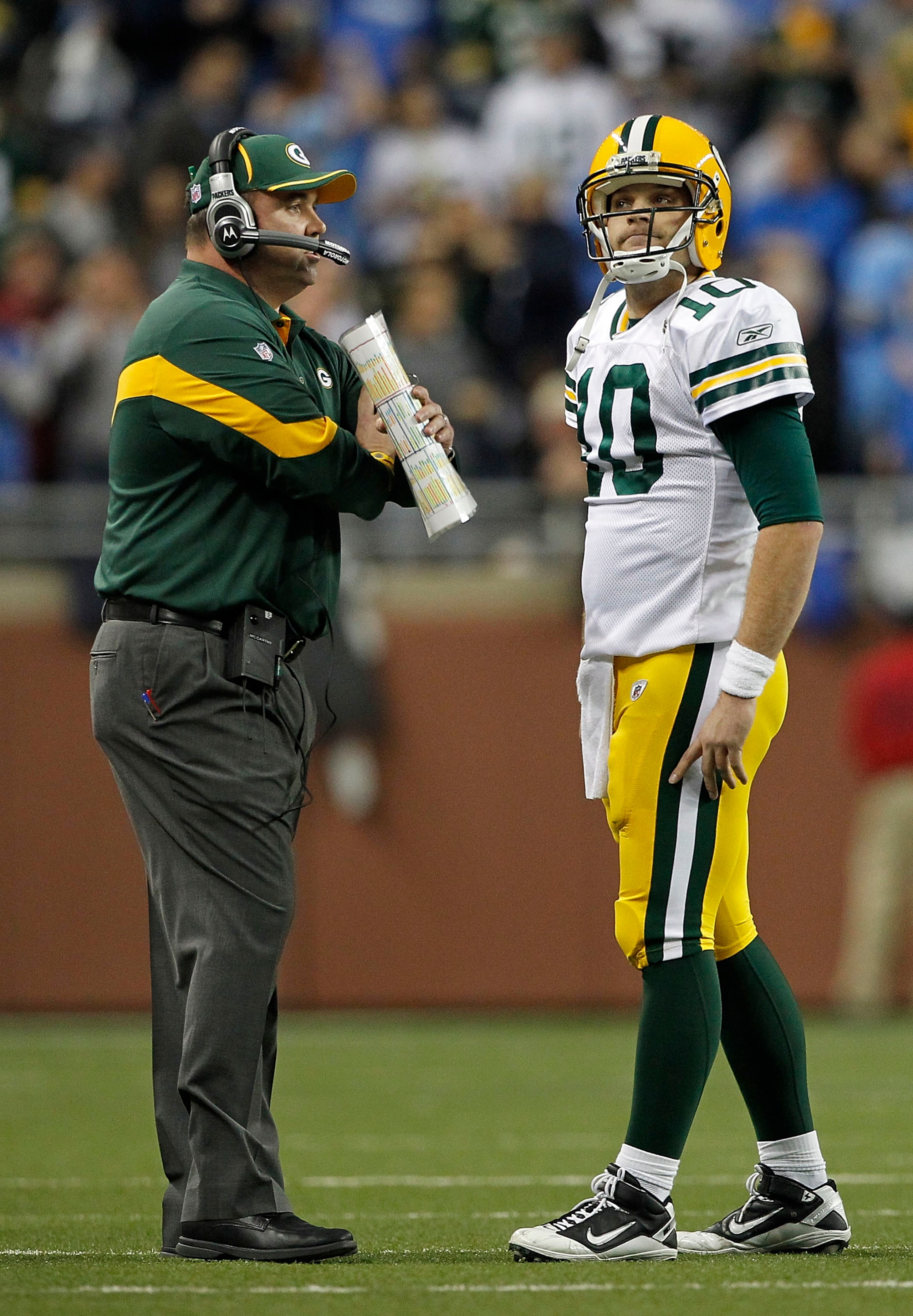 DETROIT - DECEMBER 12: Green Bay Packers head coach Mike McCarthy talks with Matt Flynn #10 after the Packers failed to convert a first down late in the game against the Detroit Lions at Ford Field on December 12, 2010 in Detroit, Michigan. The Lions defe