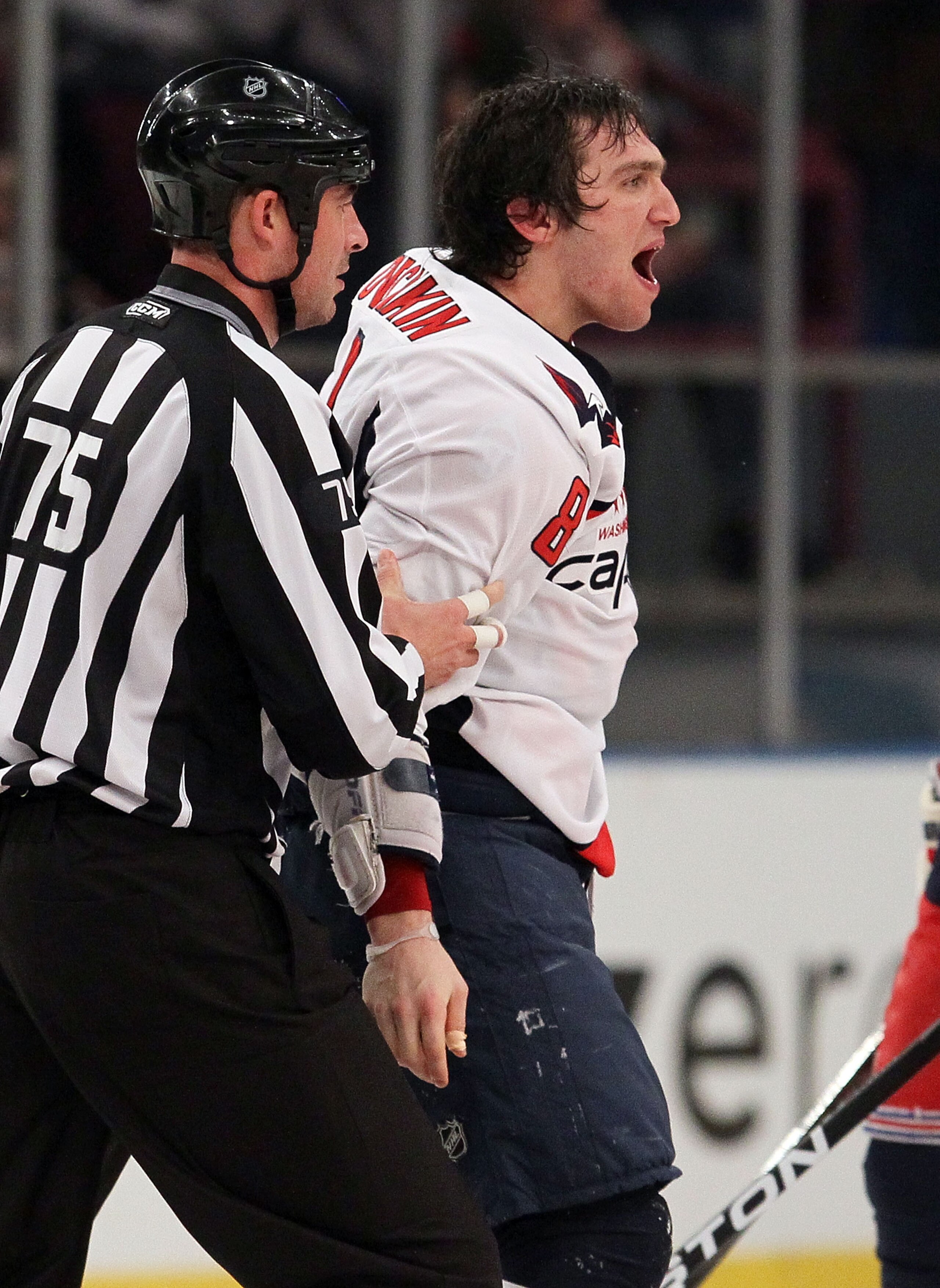 NEW YORK, NY - DECEMBER 12:  Alex Ovechkin #8 of the Washington Capitals reacts after his second period fight against Brandon Dubinsky (not pictured) of the New York Rangers on December 12, 2010 at Madison Square Garden in New York City.  (Photo by Jim Mc