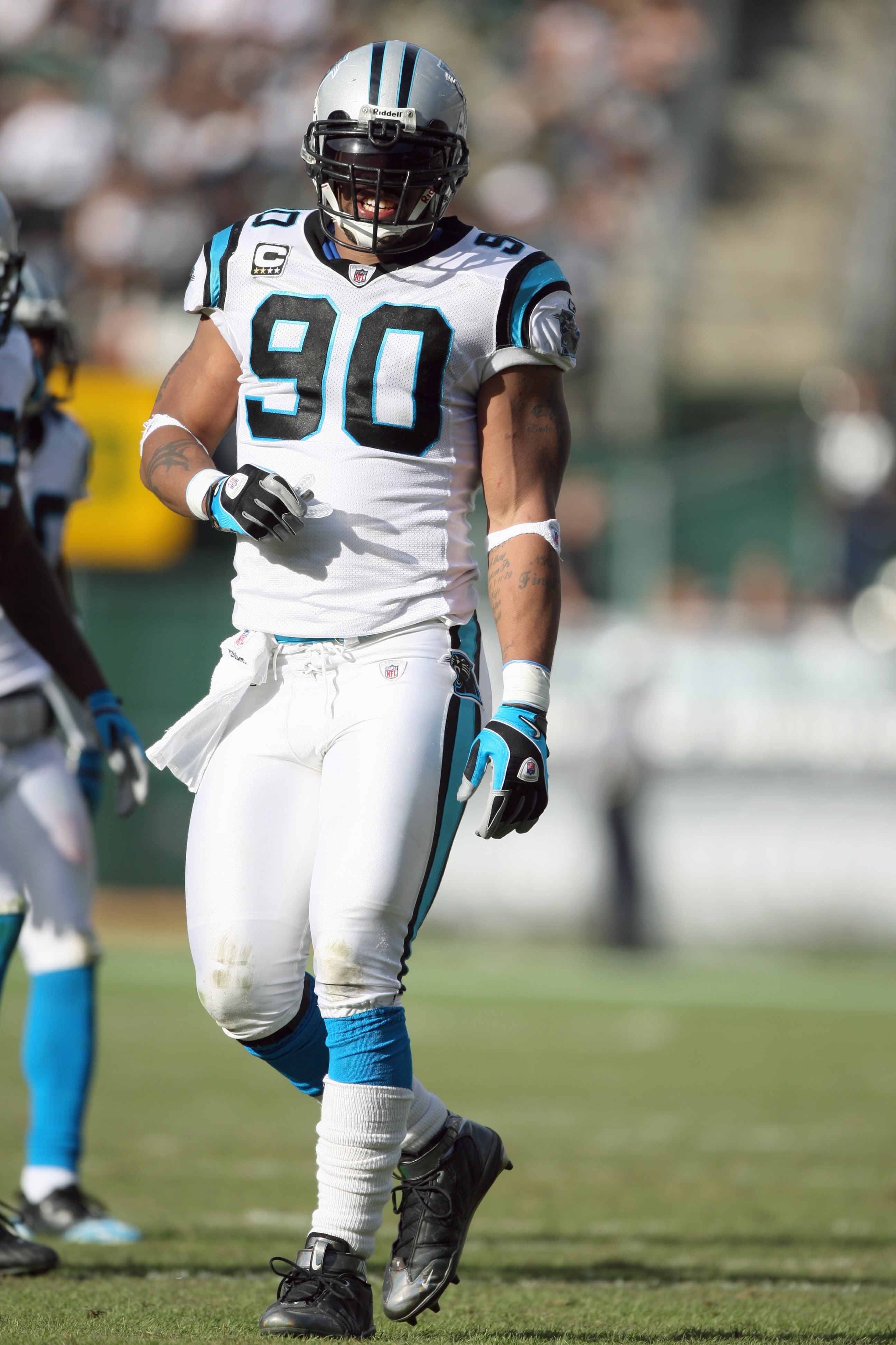 OAKLAND - NOVEMBER 9:  Julius Peppers #90 of the Carolina Panthers walks on the field during the game against the Oakland Raiders at the Oakland-Alameda County Coliseum on November 9, 2008 in Oakland, California. (Photo by: Jed Jacobsohn/Getty Images)