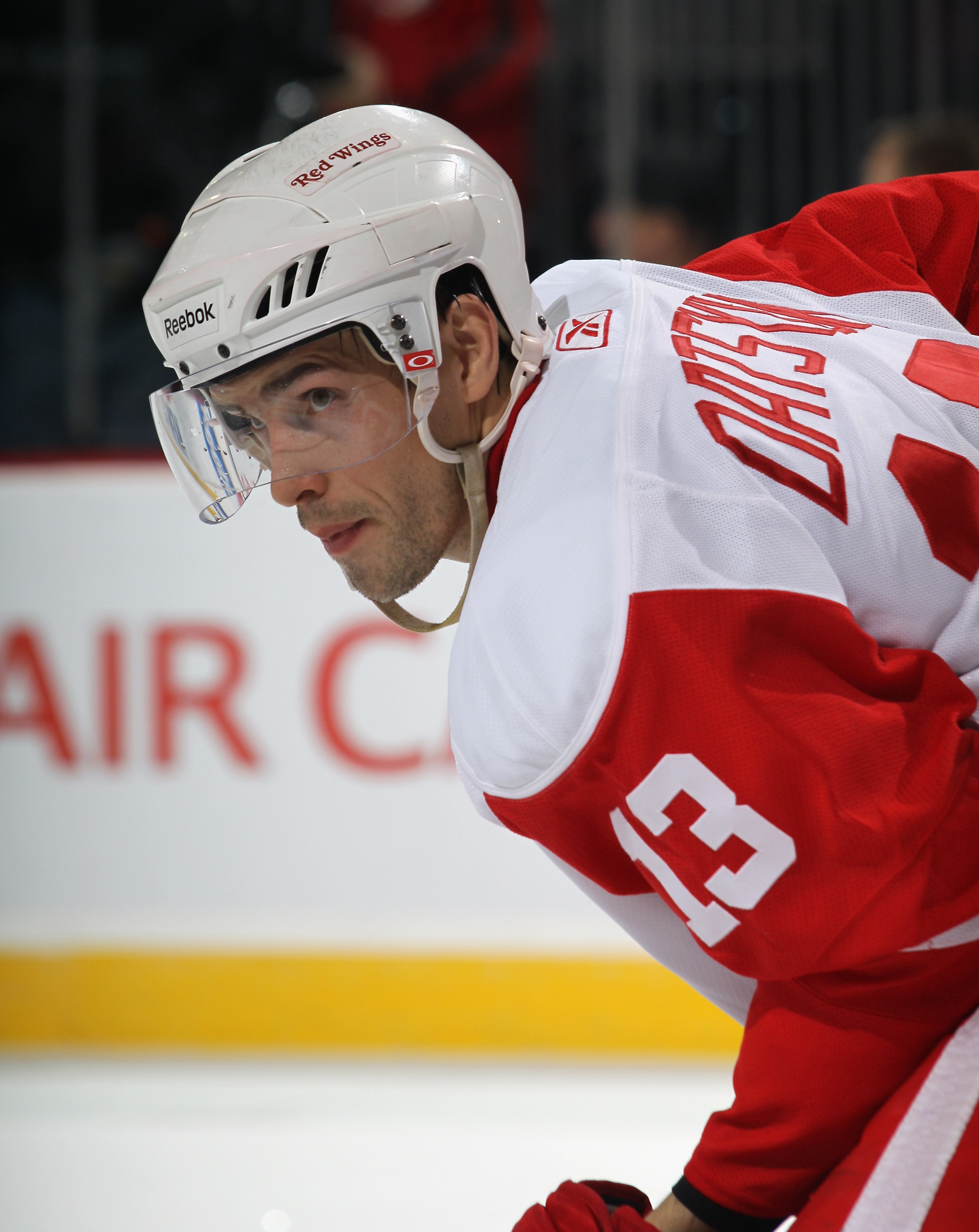NEWARK, NJ - DECEMBER 11:  Pavel Datsyuk #13 of the Detroit Red Wings skates against the New Jersey Devils at the Prudential Center on December 11, 2010 in Newark, New Jersey. The Red Wings defeated the the Devils 4-1.  (Photo by Bruce Bennett/Getty Image