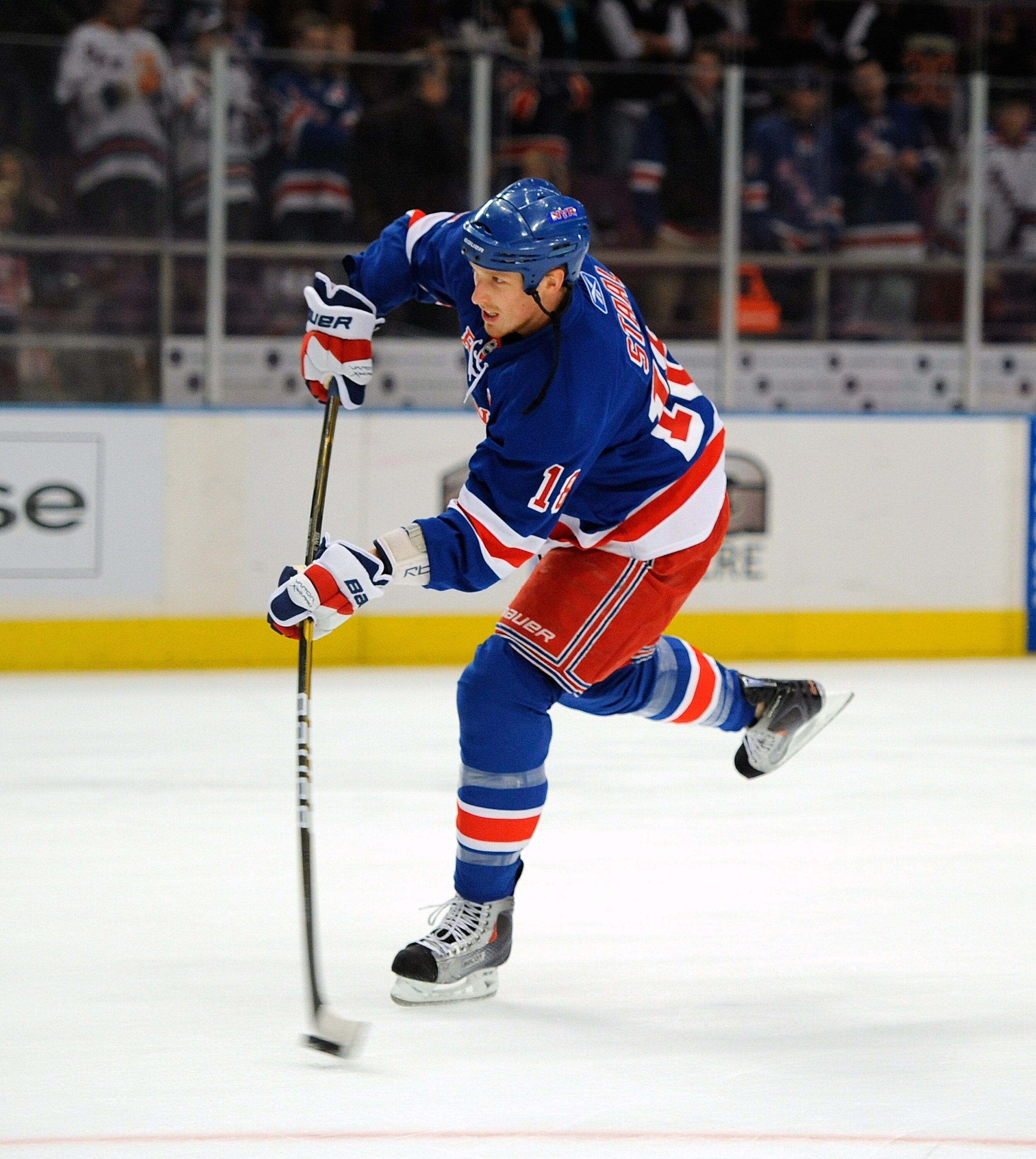 NEW YORK - NOVEMBER 22:  Marc Staal  #18 of the New York Rangers shoots the puck during warmups before a game against the Calgary Flames on November 22, 2010 at Madison Square Garden in New York City.  (Photo by Lou Capozzola/Getty Images)