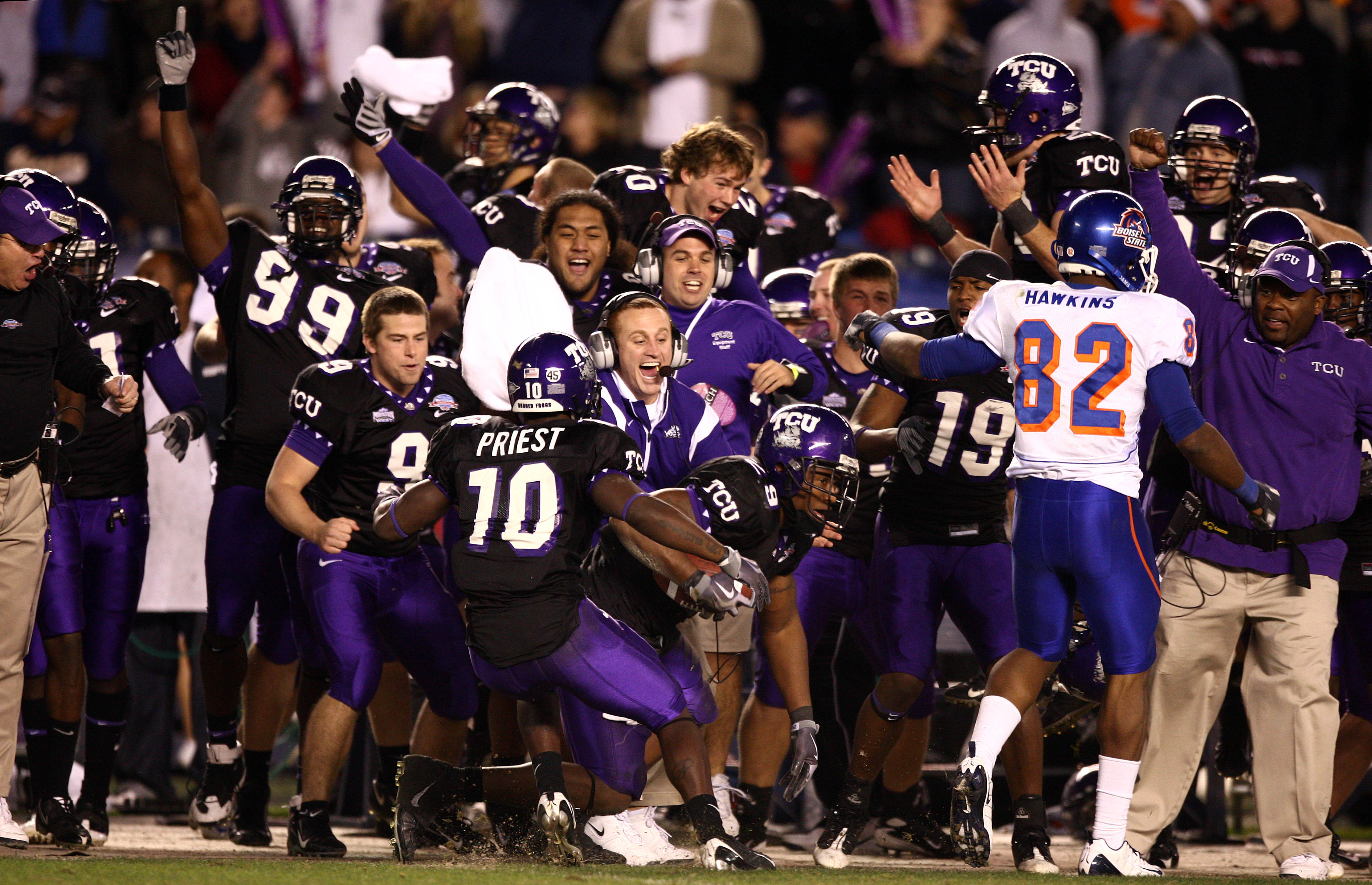 SAN DIEGO, CA - DECEMBER 23:  Players celebrate Safety Stephen Hodges interception to seal the TCU Horned Frogs' 17-16 win over Boise State Broncos during the San Diego County Credit Union Poinsettia Bowl at Qualcomm Stadium on December 23, 2008 in San Di