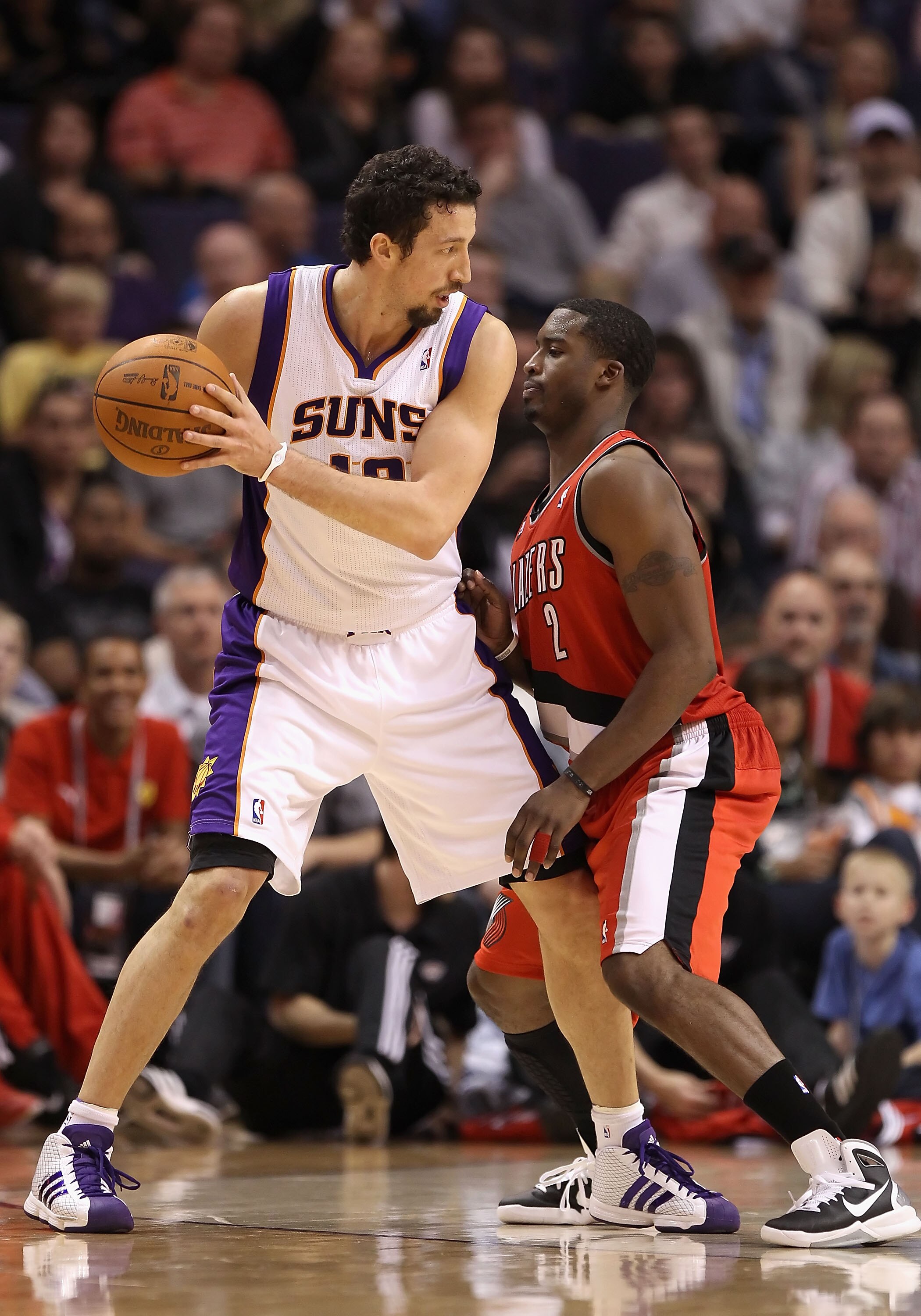 PHOENIX - DECEMBER 10:  Hedo Turkoglu #19 of the Phoenix Suns handles the ball during the NBA game against the Portland Trail Blazers at US Airways Center on December 10, 2010 in Phoenix, Arizona. The Trail Blazers defeated the Suns 101-94.  NOTE TO USER: