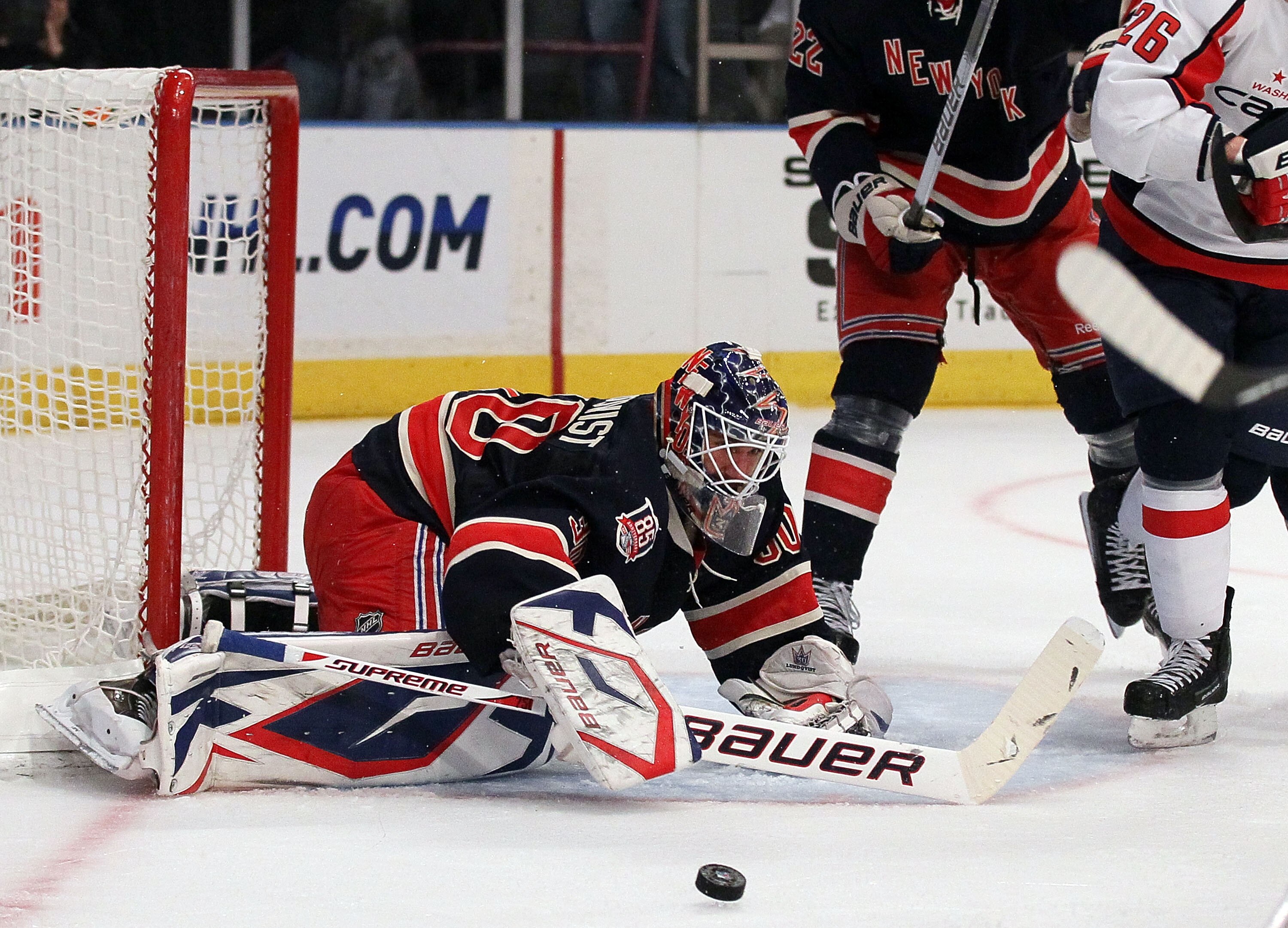 NEW YORK, NY - DECEMBER 12:  Henrik Lundqvist #30 of the New York Rangers makes a save against the Washington Capitals on December 12, 2010 at Madison Square Garden in New York City. The Rangers defeated the Capitals 7-0.  (Photo by Jim McIsaac/Getty Imag