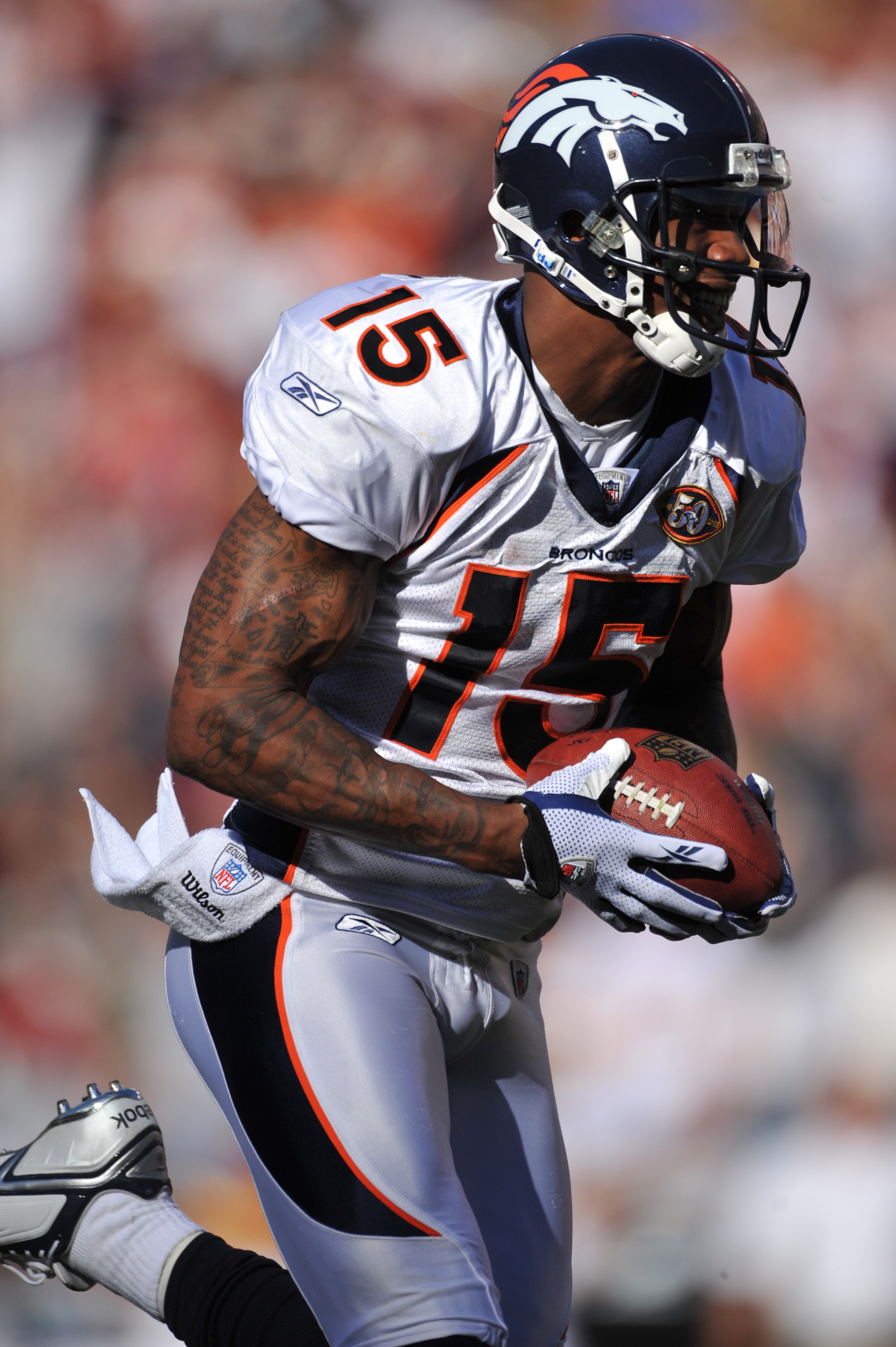 LANDOVER, MD - NOVEMBER 15:  Brandon Marshall #15 of the Denver Broncos halls in a pass for a touchdown against the Washington Redskins at FedExField on November 15, 2009 in Landover, Maryland. The Redskins defeated the Broncos 27-17. (Photo by Larry Fren