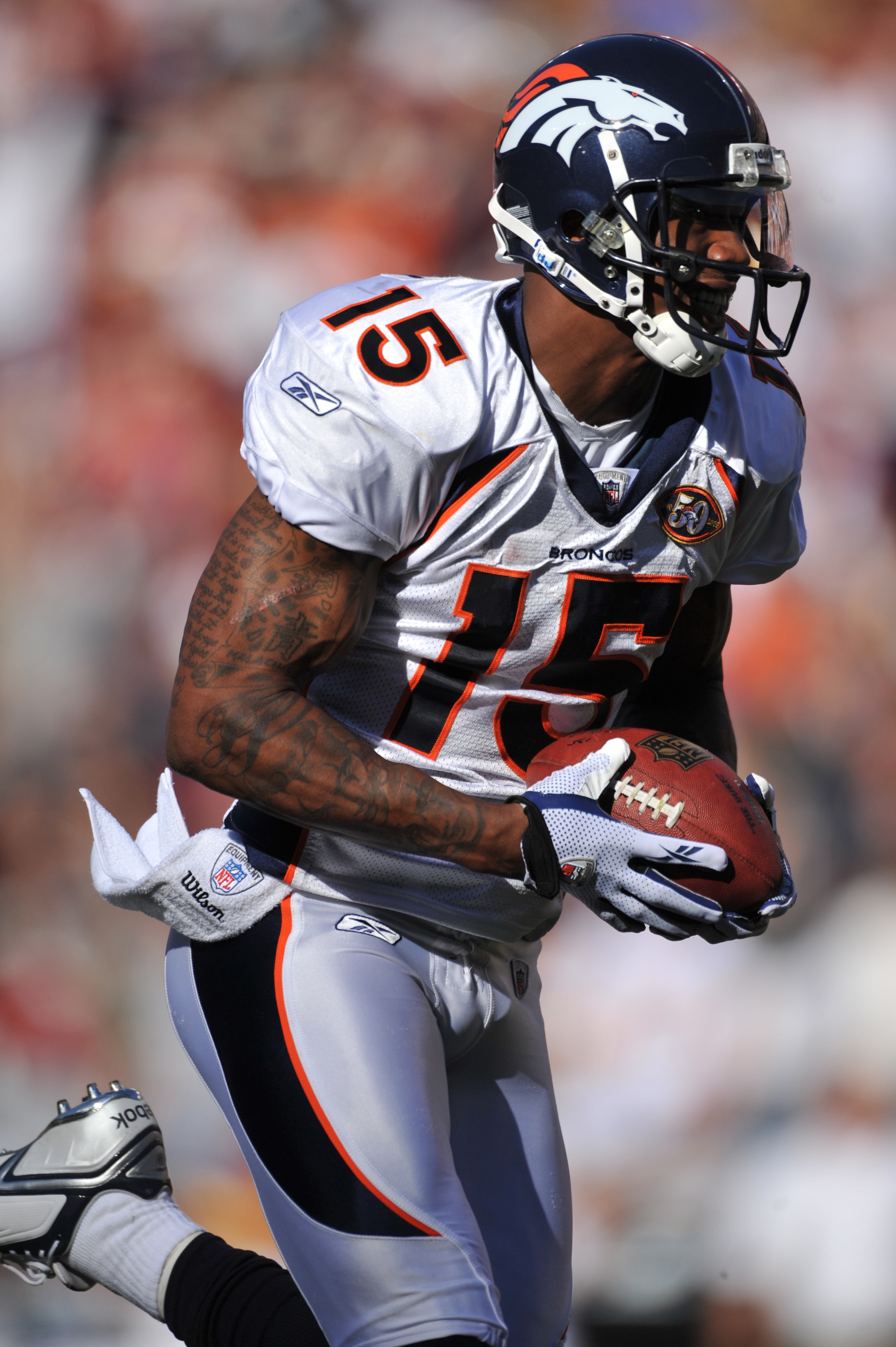 LANDOVER, MD - NOVEMBER 15:  Brandon Marshall #15 of the Denver Broncos halls in a pass for a touchdown against the Washington Redskins at FedExField on November 15, 2009 in Landover, Maryland. The Redskins defeated the Broncos 27-17. (Photo by Larry Fren