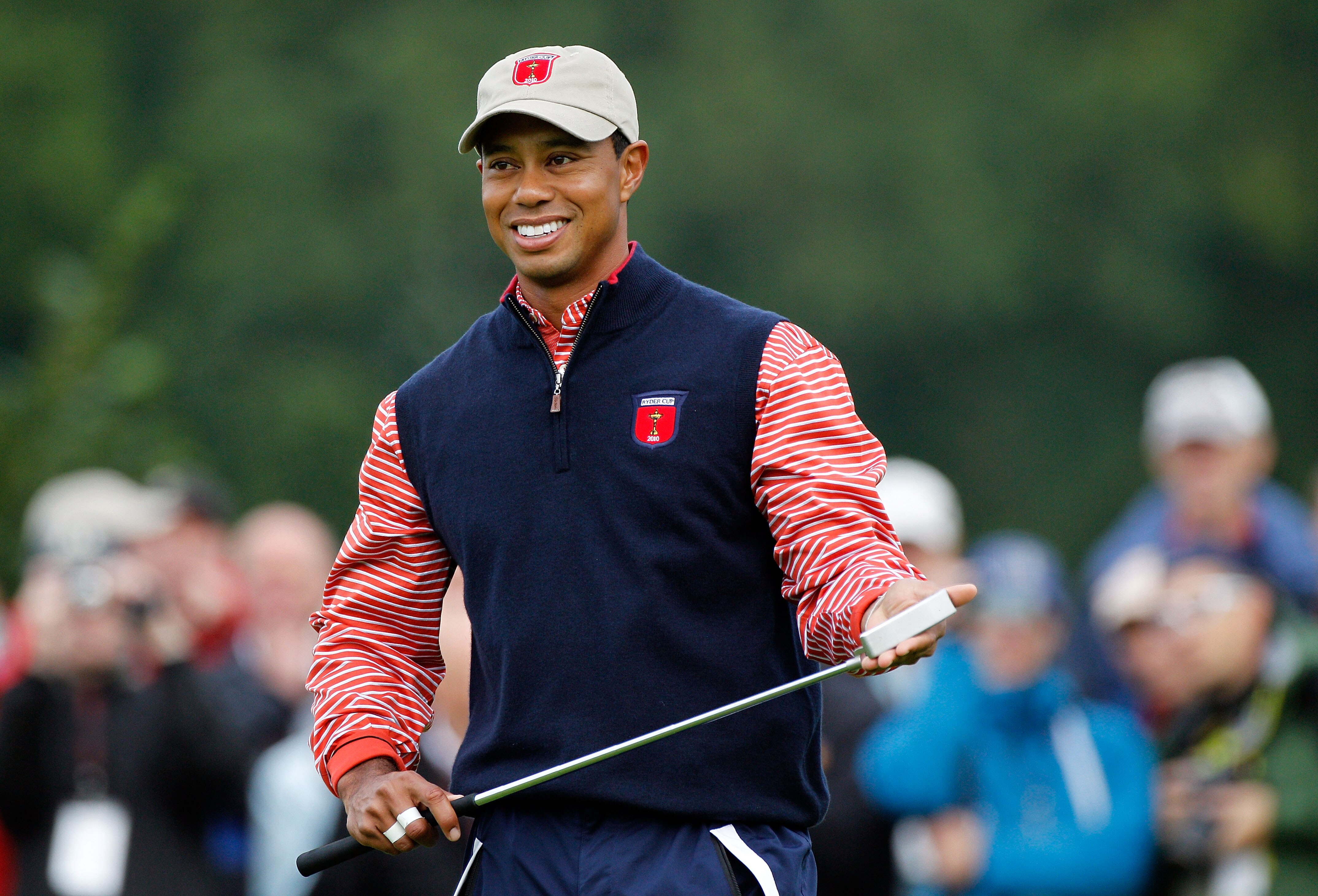 NEWPORT, WALES - SEPTEMBER 30:  Tiger Woods of the USA smiles during a practice round prior to the 2010 Ryder Cup at the Celtic Manor Resort on September 30, 2010 in Newport, Wales.  (Photo by Sam Greenwood/Getty Images)
