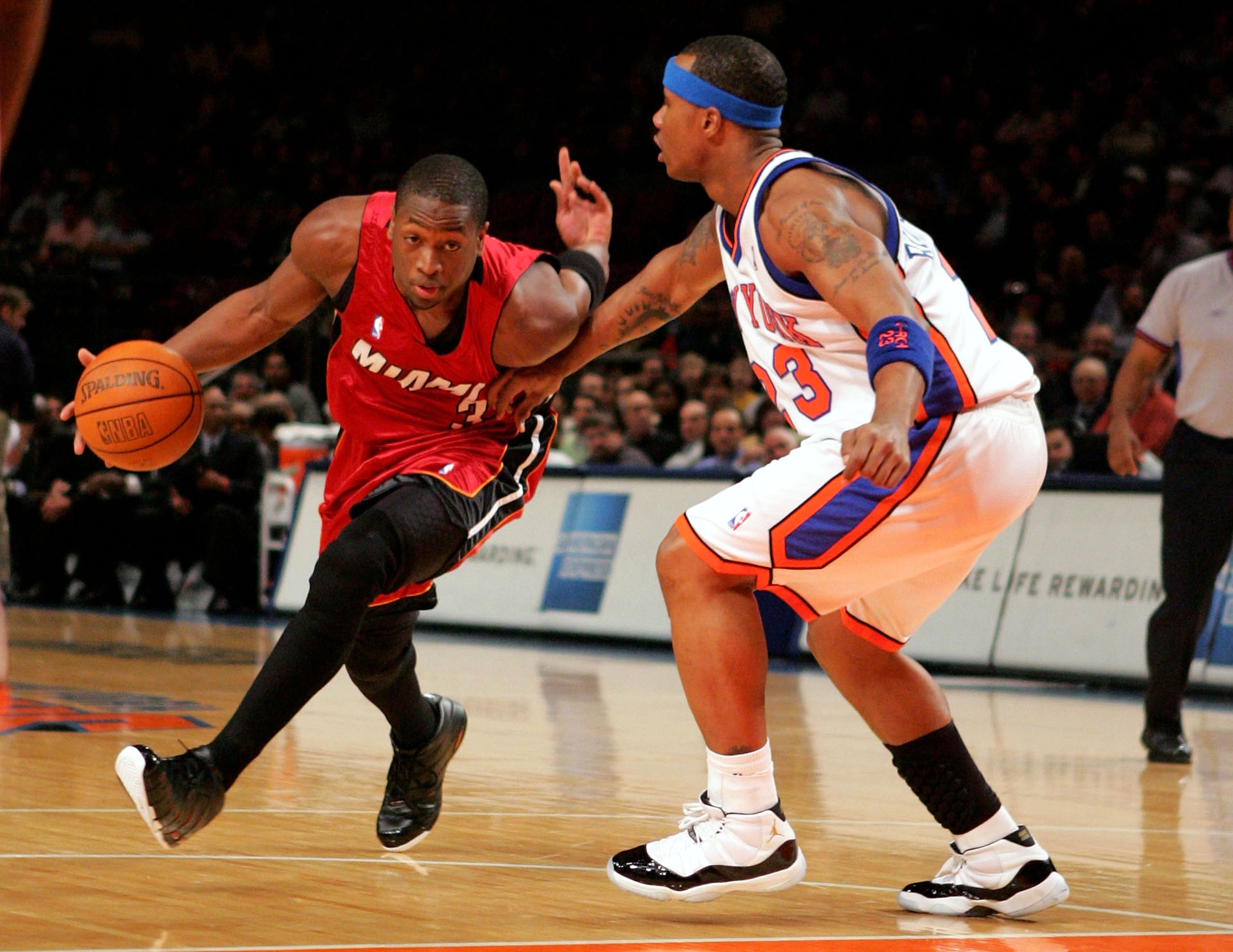 NEW YORK - FEBRUARY 22:  Dwyane Wade #3 of the Miami Heat drives past Quentin Richardson #23 of the New York Knicks on February 22, 2006 at Madison Square Garden in New York City. The Heat defeated the Knicks 103-83.  NOTE TO USER:  User expressly acknowl