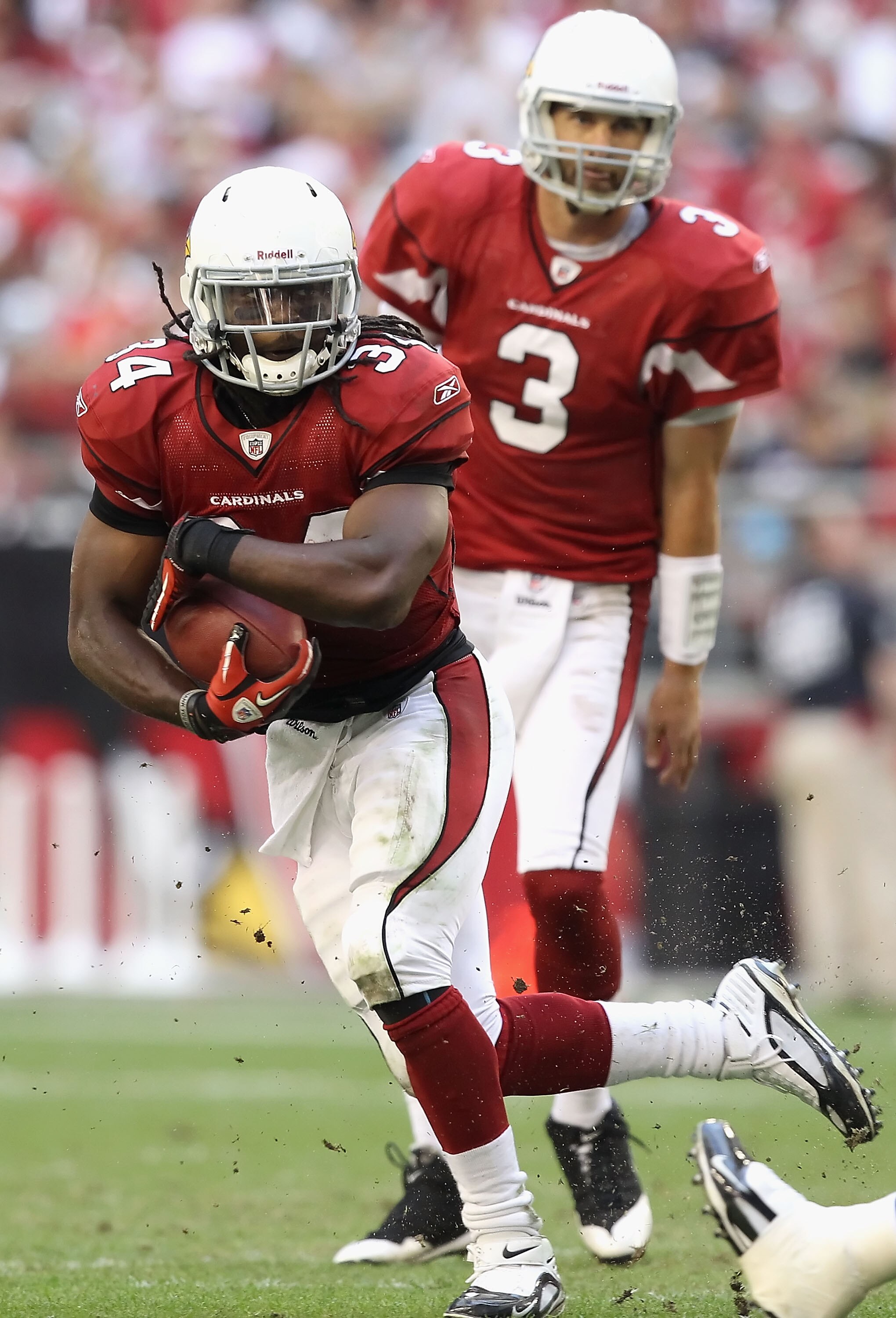GLENDALE, AZ - DECEMBER 05:  Runningback Tim Hightower #34 of the Arizona Cardinals rushes the football during the NFL game against the St. Louis Rams at the University of Phoenix Stadium on December 5, 2010 in Glendale, Arizona.  The Rams defeated the Ca