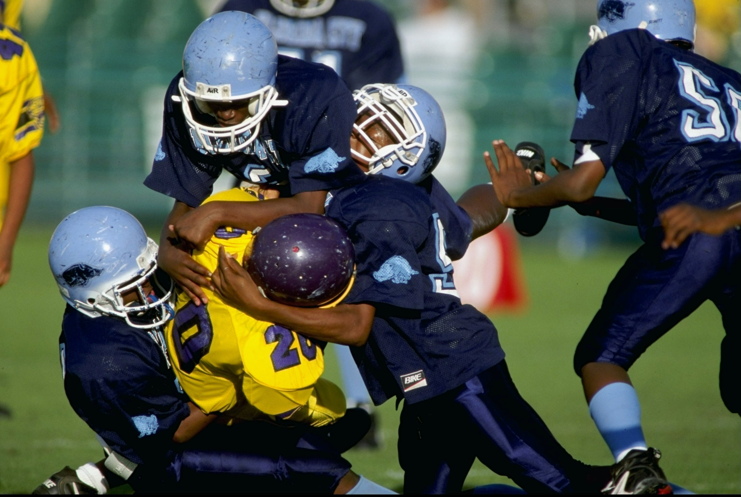 9 Dec 1998:  General view as players from Brooklyn, New York and Miami, Florida compete during the Pop Warner Pee Wee Football Super Bowl at Disney Wide World of Sports Complex in Orlando, Florida. Mandatory Credit: Scott Halleran  /Allsport