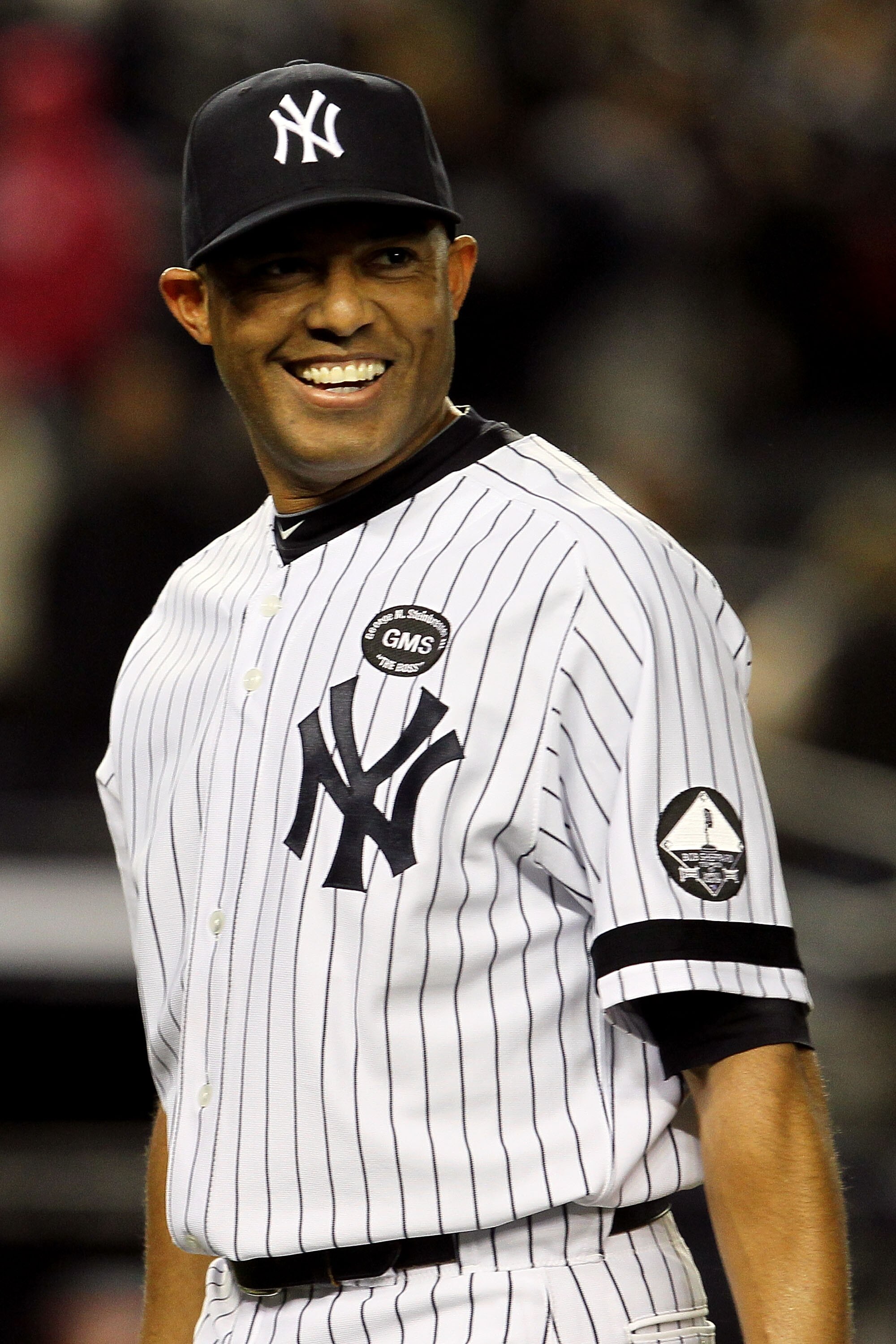 NEW YORK - OCTOBER 09:  Mariano Rivera #42 of the New York Yankees smiles after the Yankees won 6-1 against the Minnesota Twins during Game Three of the ALDS part of the 2010 MLB Playoffs at Yankee Stadium on October 9, 2010 in the Bronx borough of New Yo