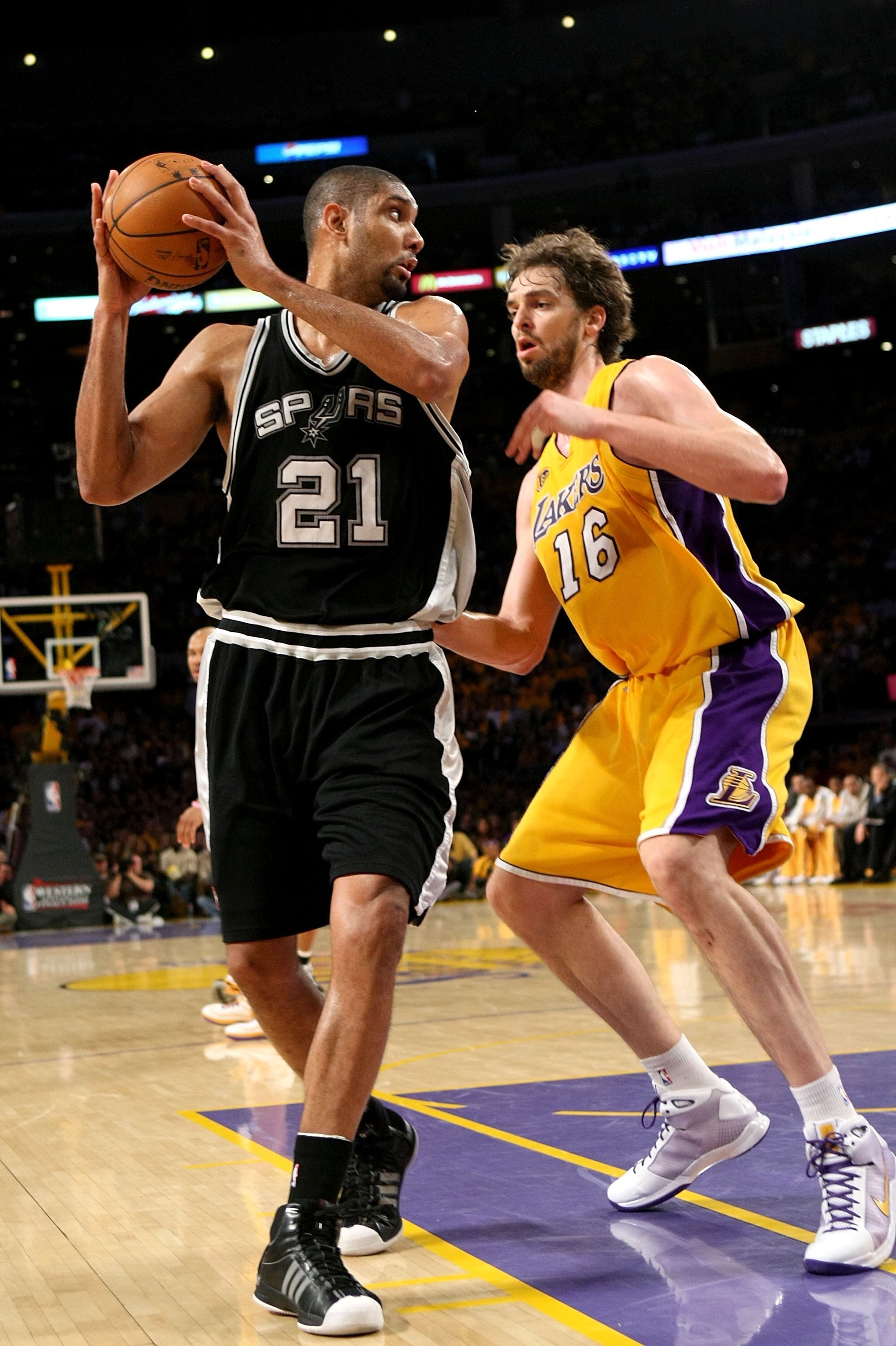 LOS ANGELES, CA - MAY 29:  Tim Duncan #21 of the San Antonio Spurs moves around Pau Gasol #16 of the Los Angeles Lakers in Game Five of the Western Conference Finals during the 2008 NBA Playoffs on May 29, 2008 at Staples Center in Los Angeles, California