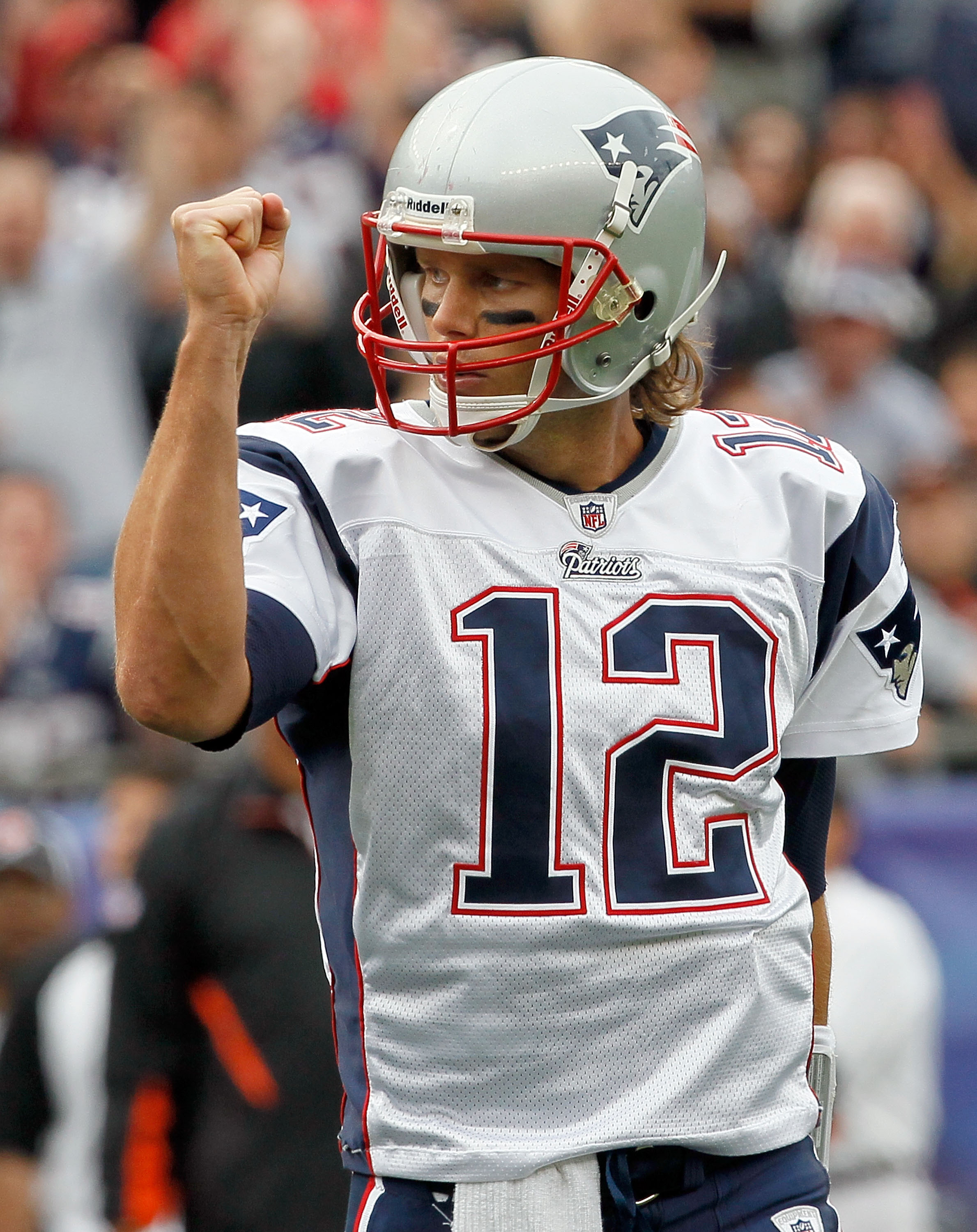 FOXBORO, MA - SEPTEMBER 12: Quarterback Tom Brady #12 reacts after teammate Wes Welker #83 scored a touchdown in the first quarter during the NFL season opener against the Cincinnati Bengals at Gillette Stadium on September 12, 2010 in Foxboro, Massachuse