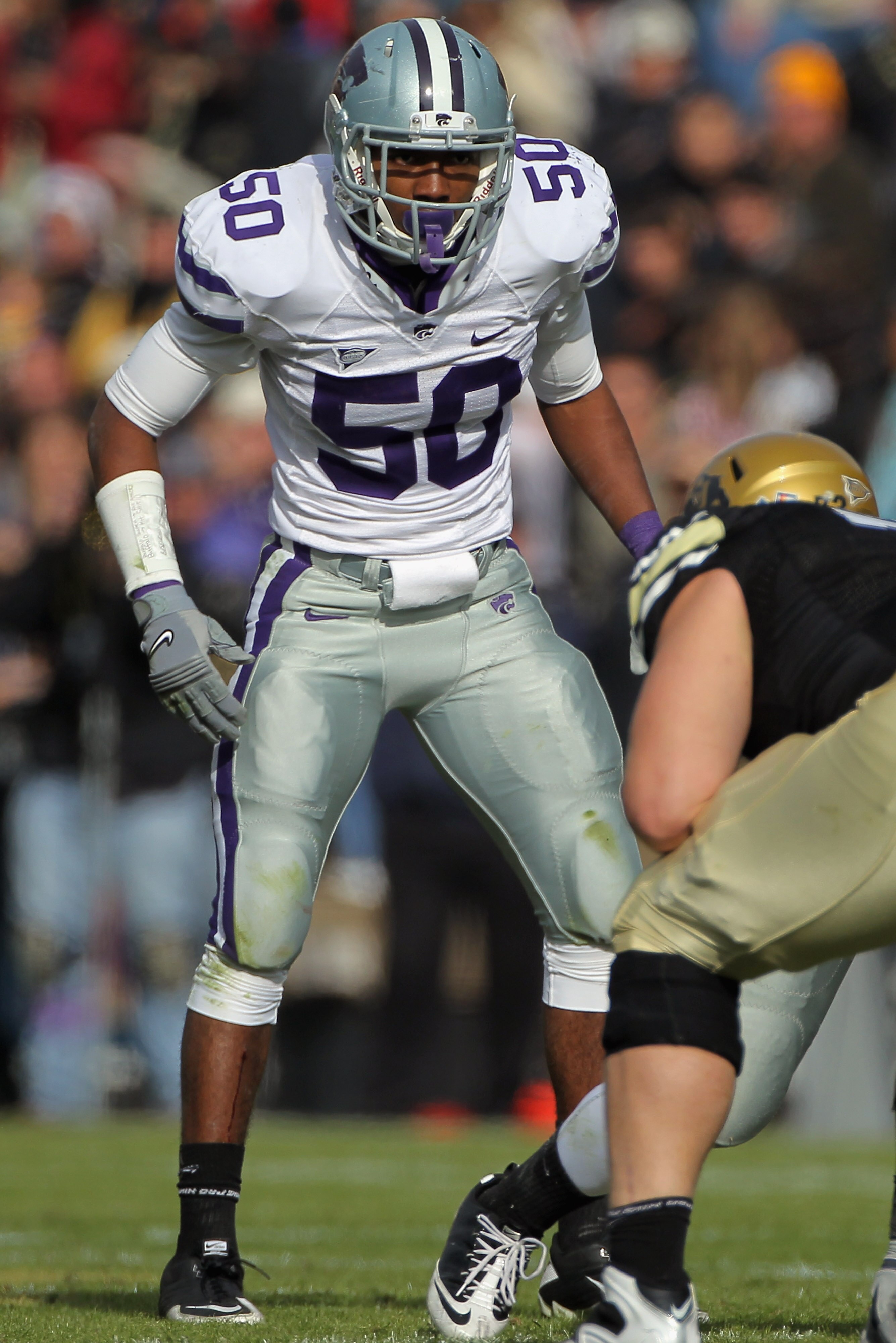 BOULDER, CO - NOVEMBER 20:  Linebacker Tre Walker #50 of the Kansas State Wildcats defends against the Colorado Buffaloes at Folsom Field on November 20, 2010 in Boulder, Colorado. Colorado defeated Kansas State 44-36.  (Photo by Doug Pensinger/Getty Imag
