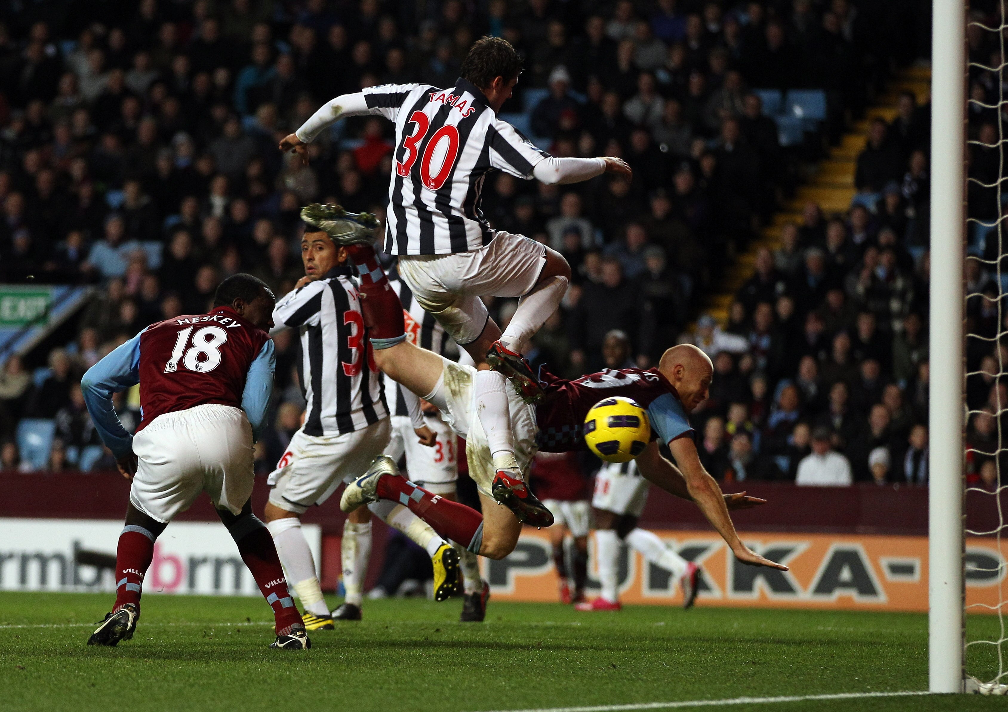 BIRMINGHAM, ENGLAND - DECEMBER 11:  Emile Heskey of Villa scores the second goal during the Barclays Premier League match between Aston Villa and West Bromwich Albion at Villa Park on December 11, 2010 in Birmingham, England.  (Photo by Richard Heathcote/