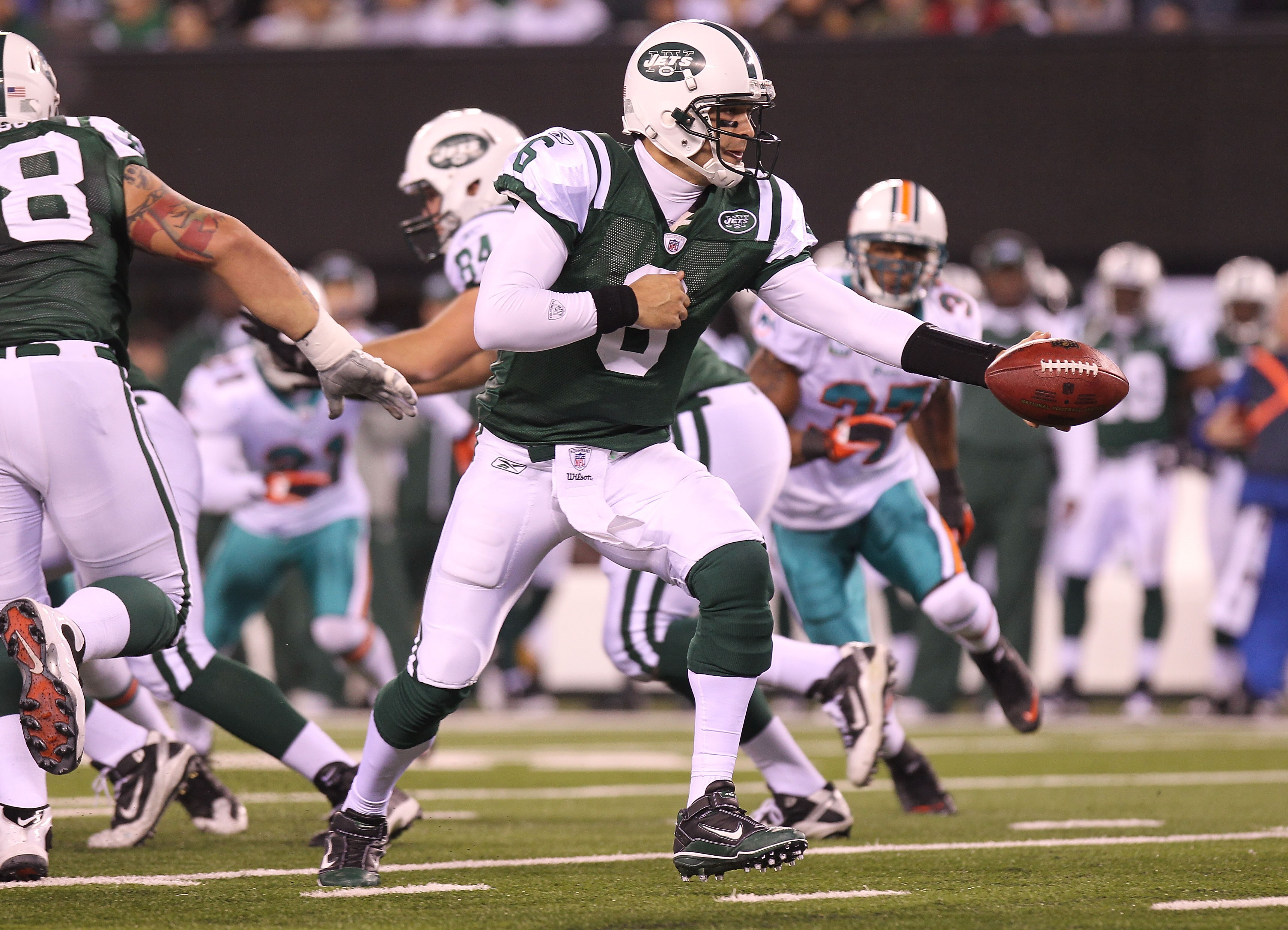EAST RUTHERFORD, NJ - DECEMBER 12:  Mark Sanchez #6 of the New York Jets against the Miami Dolphins at New Meadowlands Stadium on December 12, 2010 in East Rutherford, New Jersey.  (Photo by Nick Laham/Getty Images)