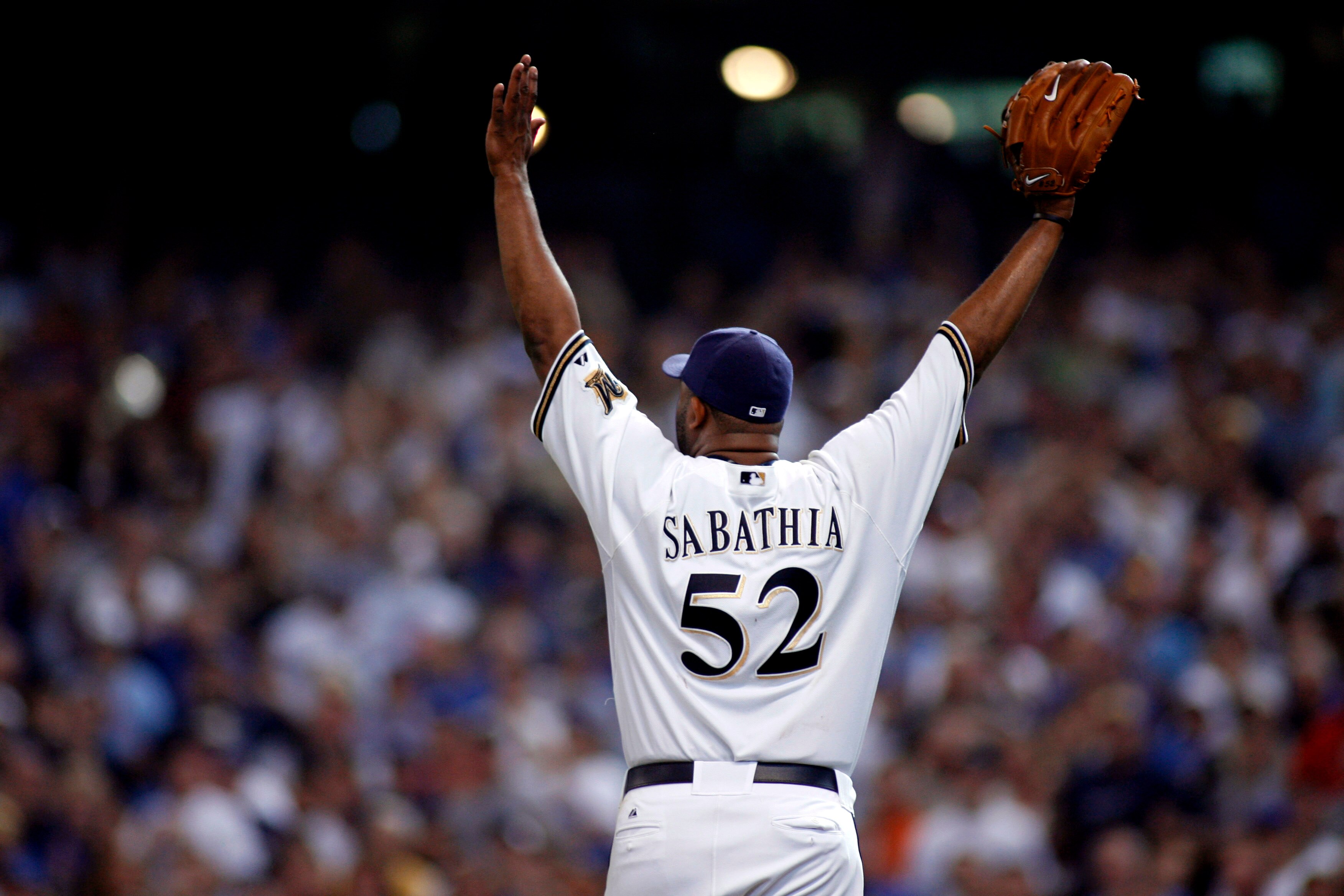 MILWAUKEE - SEPTEMBER 28:  Starting pitcher CC Sabathia #52 of the Milwaukee Brewers celebrates after pitching a complete game against the Chicago Cubs at Miller Park on September 28, 2008 in Milwaukee, Wisconsin. The Brewers defeated the Cubs 3-1 (Photo