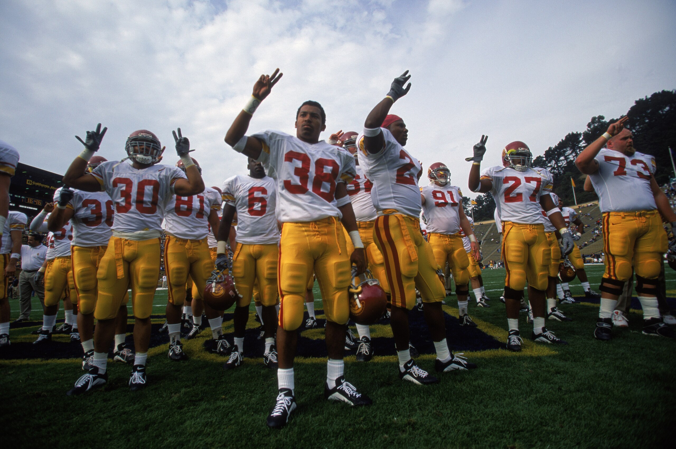 10 Nov 2001:  Cornerback Justin Tolliver #38 and his USC teammates show their school spirit before the Pac-10 game against California at Memorial Stadium in Berkeley, California. USC crushed California 55-14.Mandatory Credit:  Donald Miralle/Allsport