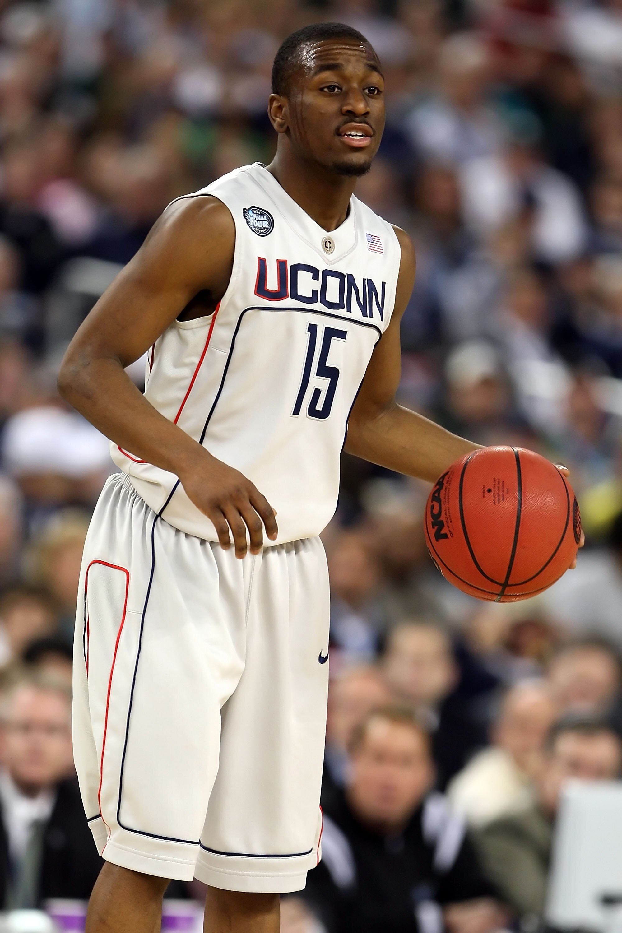 DETROIT - APRIL 04:  Kemba Walker #15 of the Connecticut Huskies moves the ball against the Michigan State Spartans during the National Semifinal game of the NCAA Division I Men's Basketball Championship at Ford Field on April 4, 2009 in Detroit, Michigan